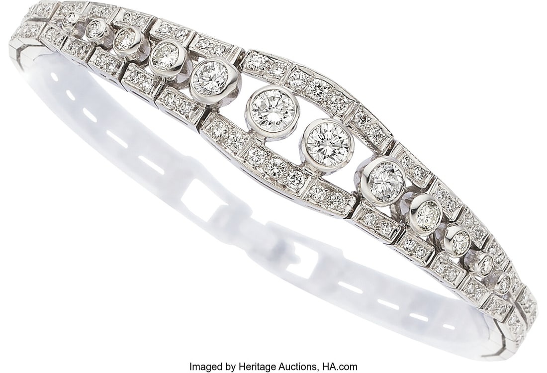 Diamond, White Gold Bracelet Stones: Full-cut d: Diamond, White Gold Bracelet Stones: Full-cut diamonds weighing a total of approximately 1.50 carats; single-cut diamonds weighing a total of approximately 1.25 carats M