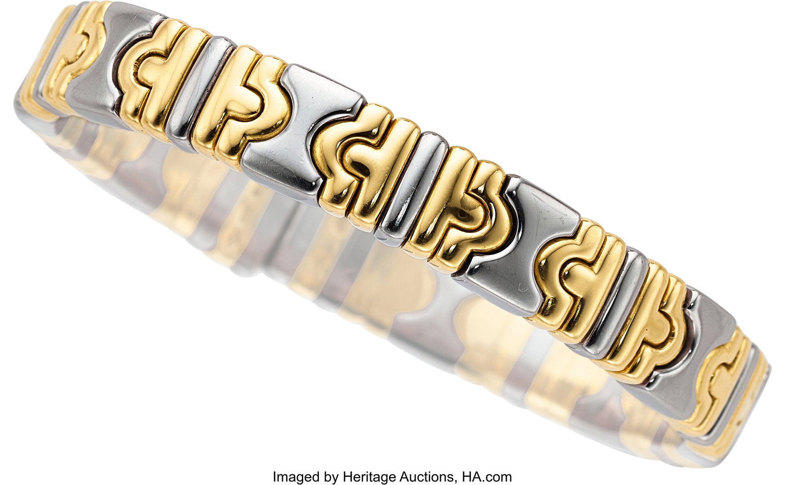 Bvlgari Gold, Stainless Steel Bracelet Metal: 1: Bvlgari Gold, Stainless Steel Bracelet Metal: 18k gold and stainless steel Marked: Bvlgari Collection: Parentesi Gross Weight: 56.20 grams Dimensions: 6-1&so