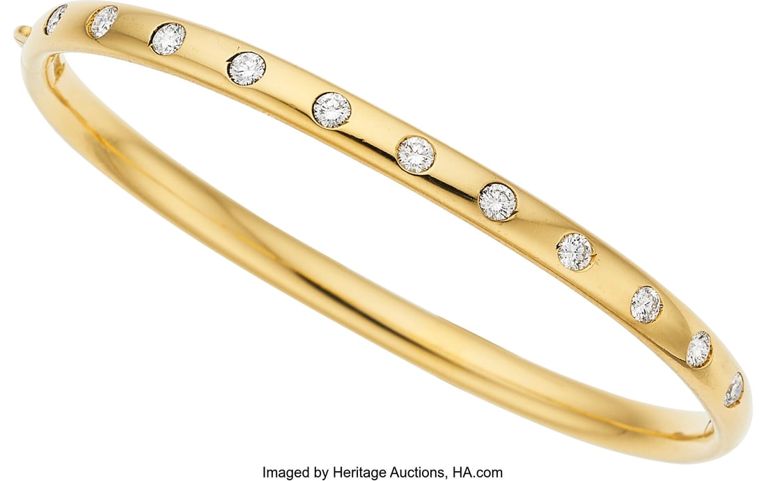 Diamond, Gold Bracelet Stones: Full-cut diamond: Diamond, Gold Bracelet Stones: Full-cut diamonds weighing a total of approximately 0.75 carat Metal: 18k gold Gross Weight: 17.10 grams Dimensions: 6-1/
