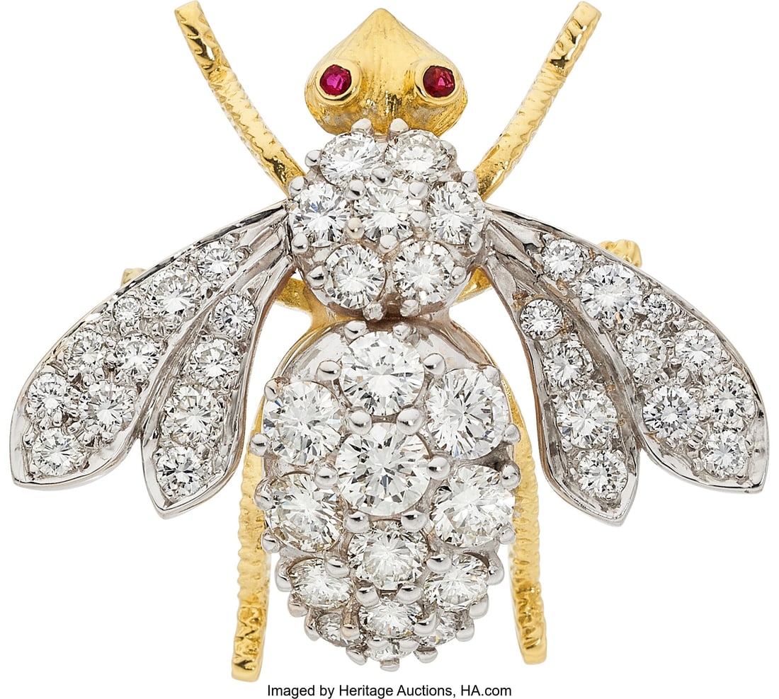 Diamond, Ruby, Gold Brooch Stones: Full-cut dia: Diamond, Ruby, Gold Brooch Stones: Full-cut diamonds weighing a total of approximately 5.00 carats; round-shaped rubies Metal: 18k white and yellow gold Gross Weigh