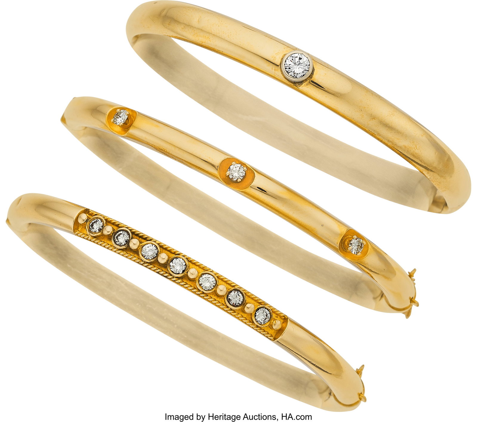 Diamond, Gold Bracelets Stones: Full-cut diamon: Diamond, Gold Bracelets Stones: Full-cut diamonds weighing a total of approximately 1.00 carat Metal: 14k gold Marked: Krementz (one bezel set diamond) Gross W