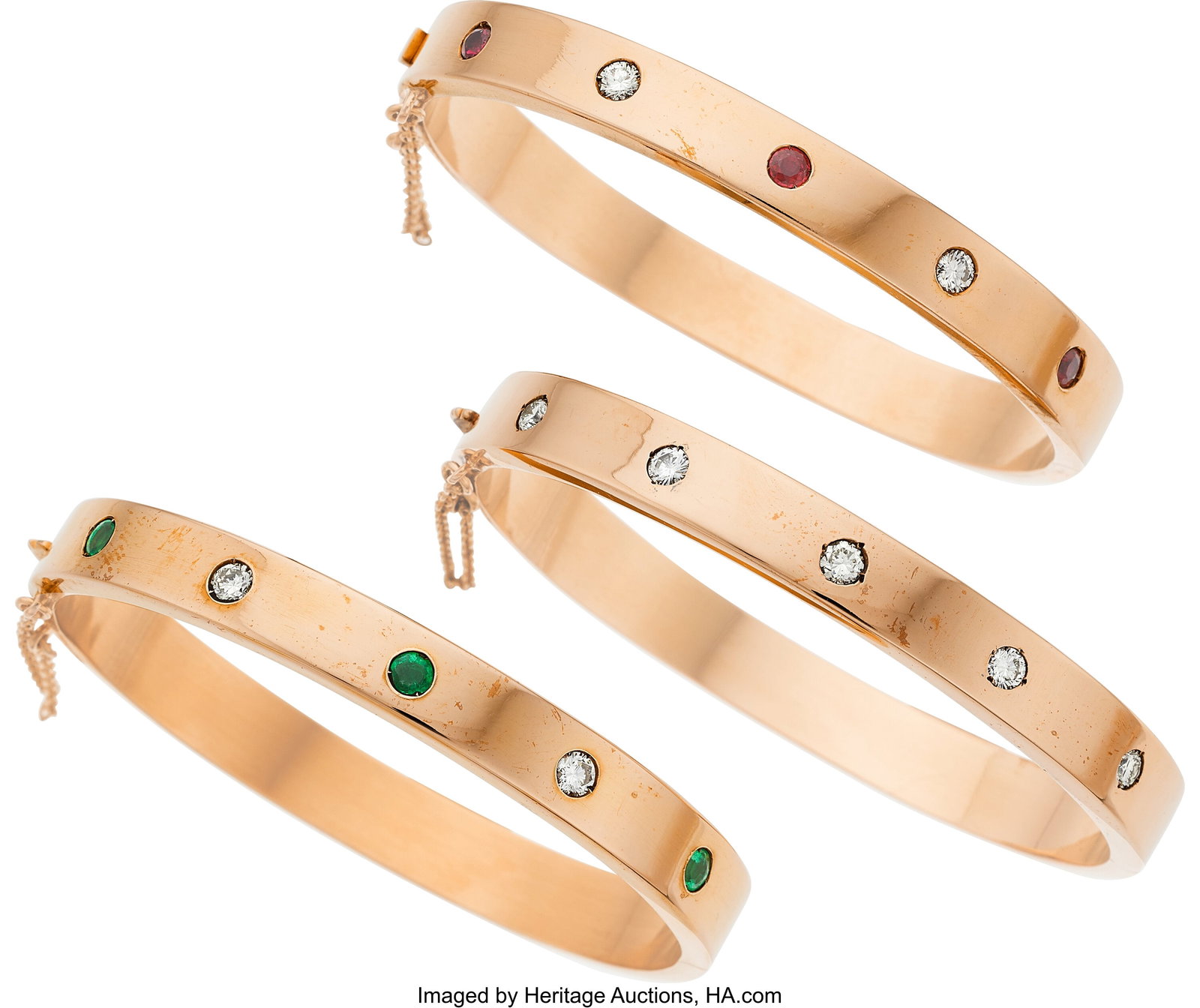 Diamond, Ruby, Emerald, Gold Bracelets Stones: : Diamond, Ruby, Emerald, Gold Bracelets Stones: Full-cut diamonds weighing a total of approximately 1.50 carats; round-shaped rubies weighing a total of approximatel