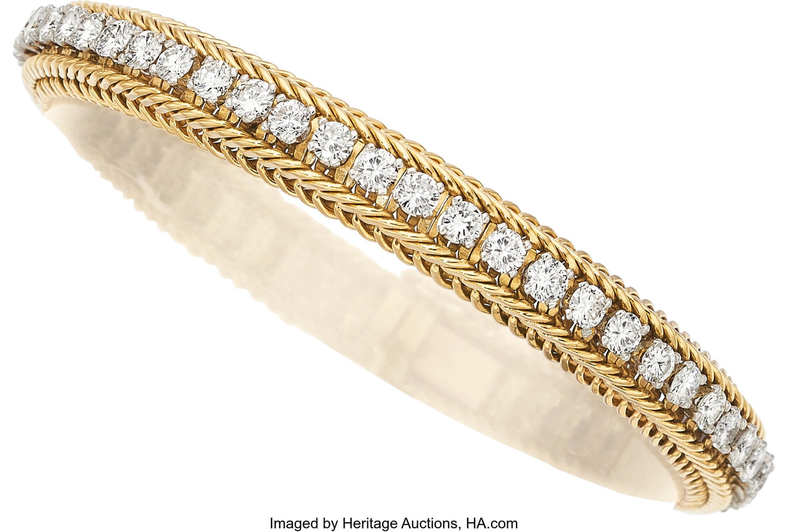 Neiman Marcus Diamond, Gold Bracelet, French St: Neiman Marcus Diamond, Gold Bracelet, French Stones: Full-cut diamonds weighing a total of approximately 6.00 carats Metal: 18k gold Marked: for Neiman Marcus&semi