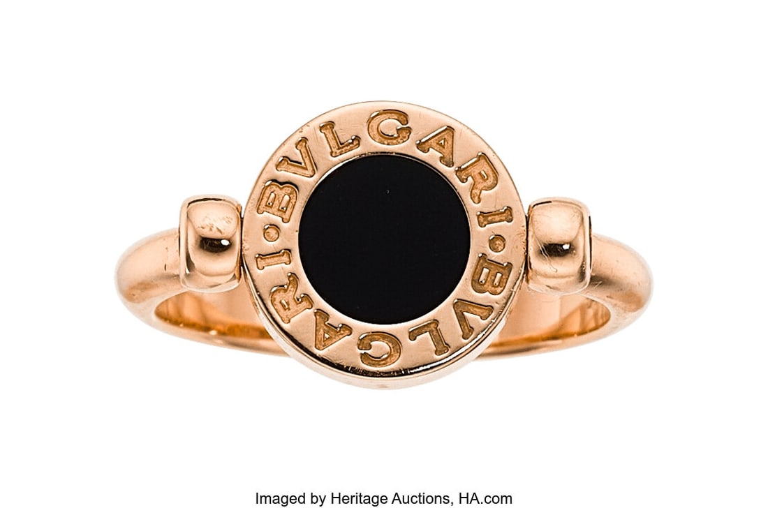 Bvlgari Black Onyx, Mother-of-Pearl, Rose Gold : Bvlgari Black Onyx, Mother-of-Pearl, Rose Gold Ring Stones: Carved mother-of-pearl; carved black onyx Metal: 18k rose gold Marked: Bvlgari Collection: Bvlgari