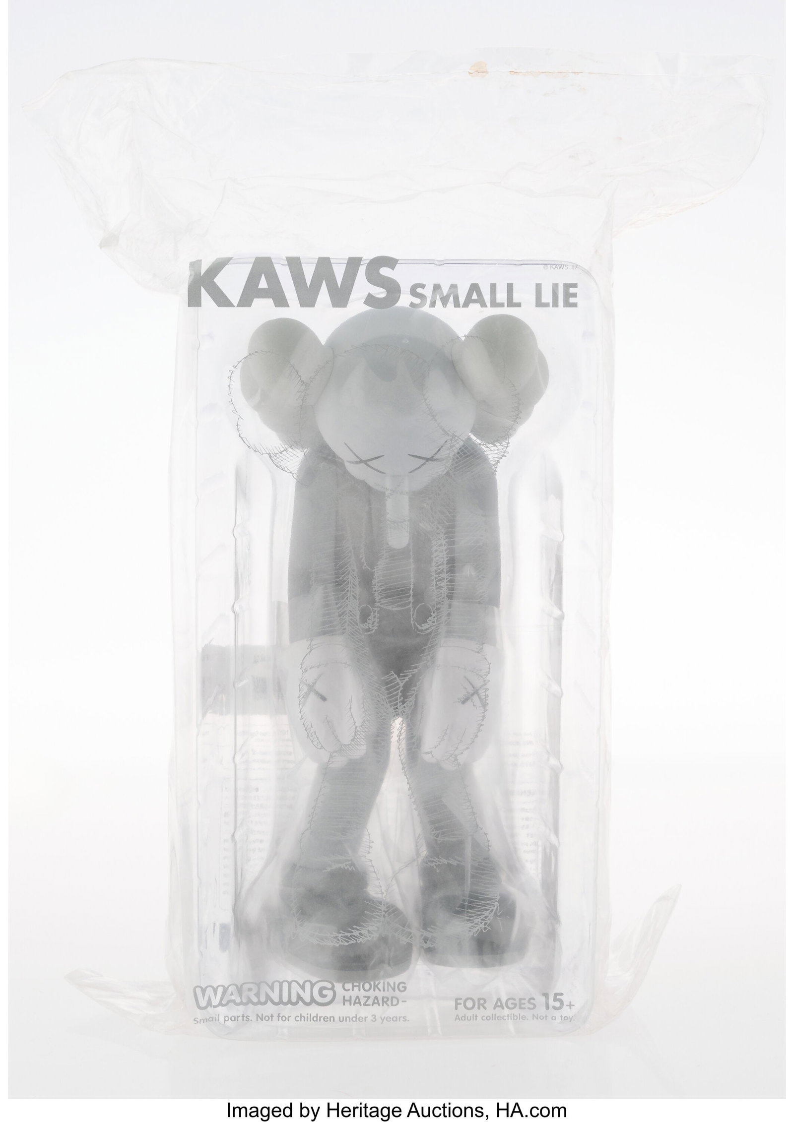 KAWS (b. 1974) Small Lie (Grey), 2017 Painted ca: KAWS (b. 1974) Small Lie (Grey), 2017 Painted cast vinyl 11 x 5 x 4-1/2 inches (27.9 x 12.7 x 11.4 cm) Stamped on underside of feet 