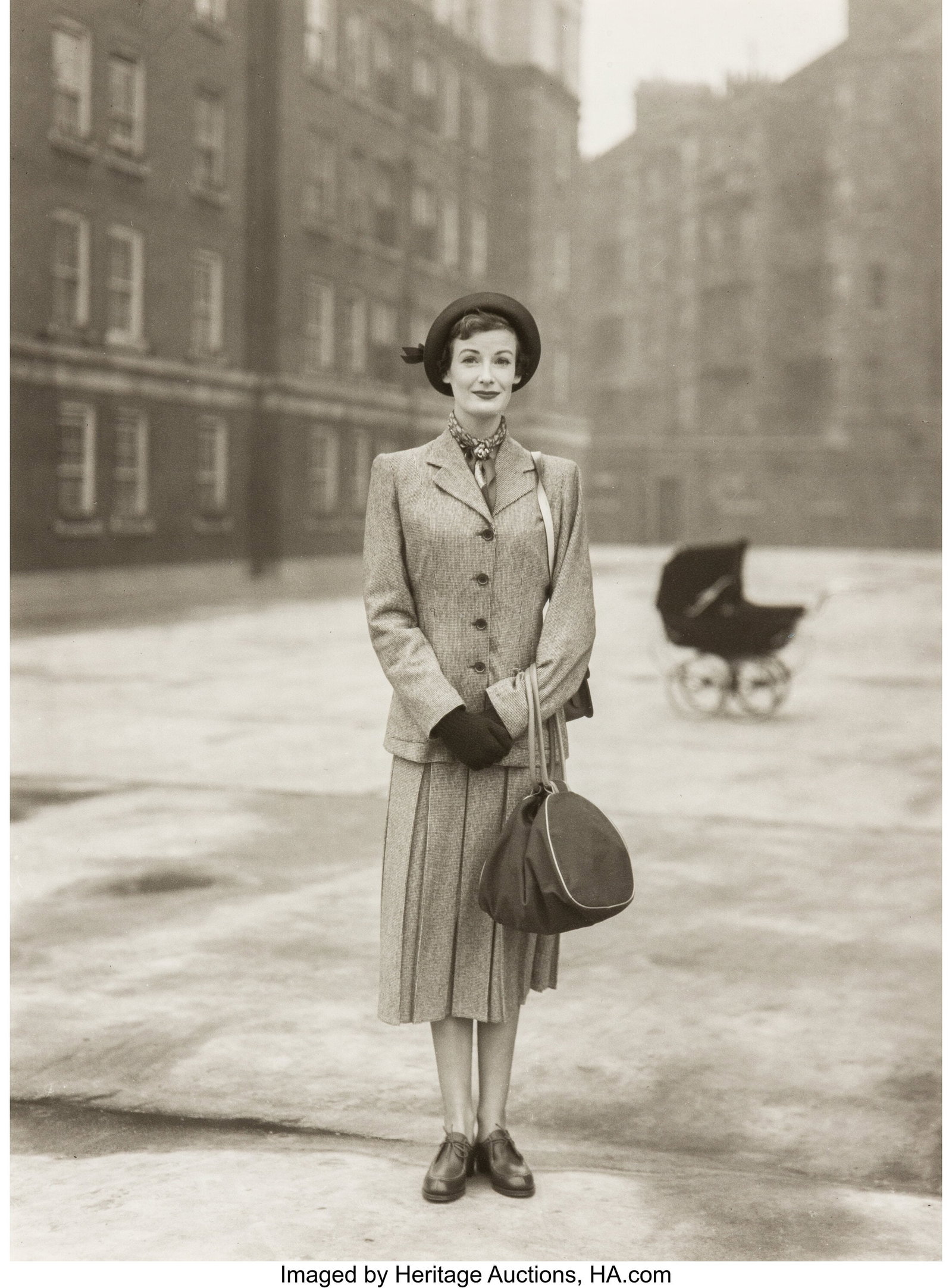 Norman Parkinson (British, 1913-1990) Wenda Park: Norman Parkinson (British, 1913-1990) Wenda Parkinson in a Simpson's Suit, Peabody Trust Buildings, Fulham Road, London, 1949 Gelatin silver print on Agfa paper