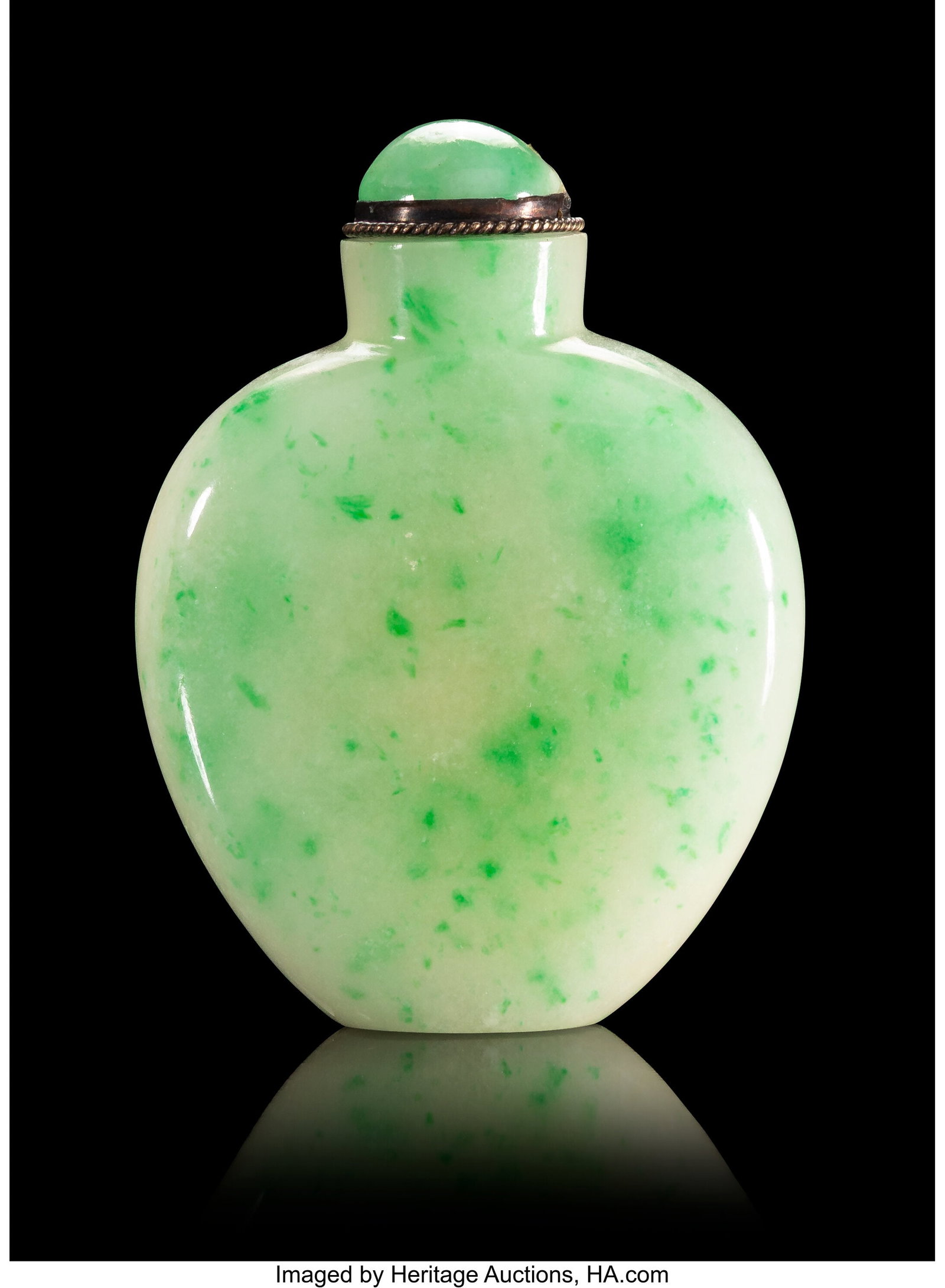 A Chinese Carved Emerald Green Flecked Jadeite S: A Chinese Carved Emerald Green Flecked Jadeite Snuff Bottle, 19th century 2-1/4 x 1-3/4 x 0-1/2 inches (5.7 x 4.4 x 1.3 cm) Property from the Collectio