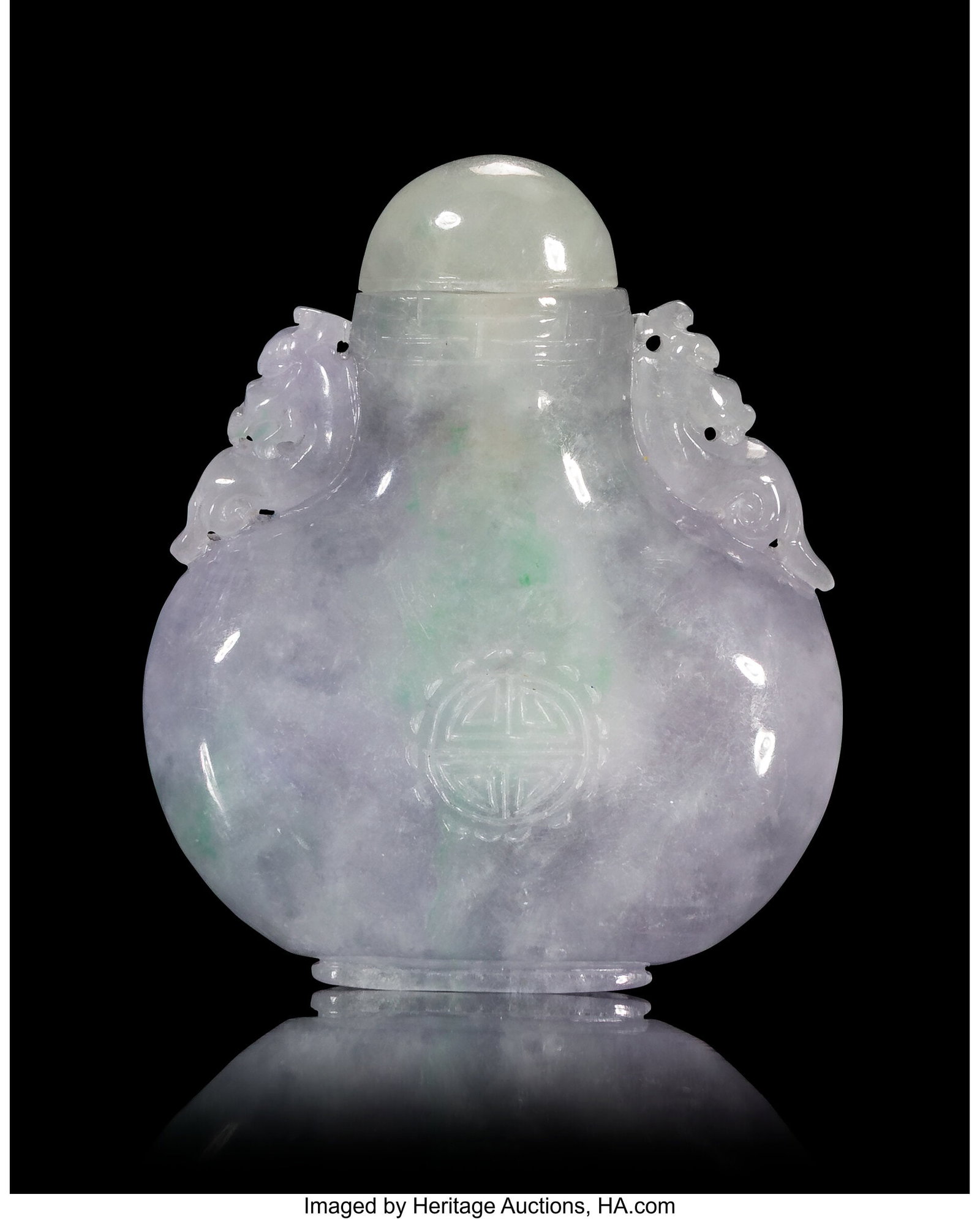 A Chinese Carved Lavender Jadeite Snuff Bottle, : A Chinese Carved Lavender Jadeite Snuff Bottle, 20th century 2-1/4 x 1-7/8 x 0-3/8 inches (5.7 x 4.8 x 1.0 cm) Property from the Collection of Jack and