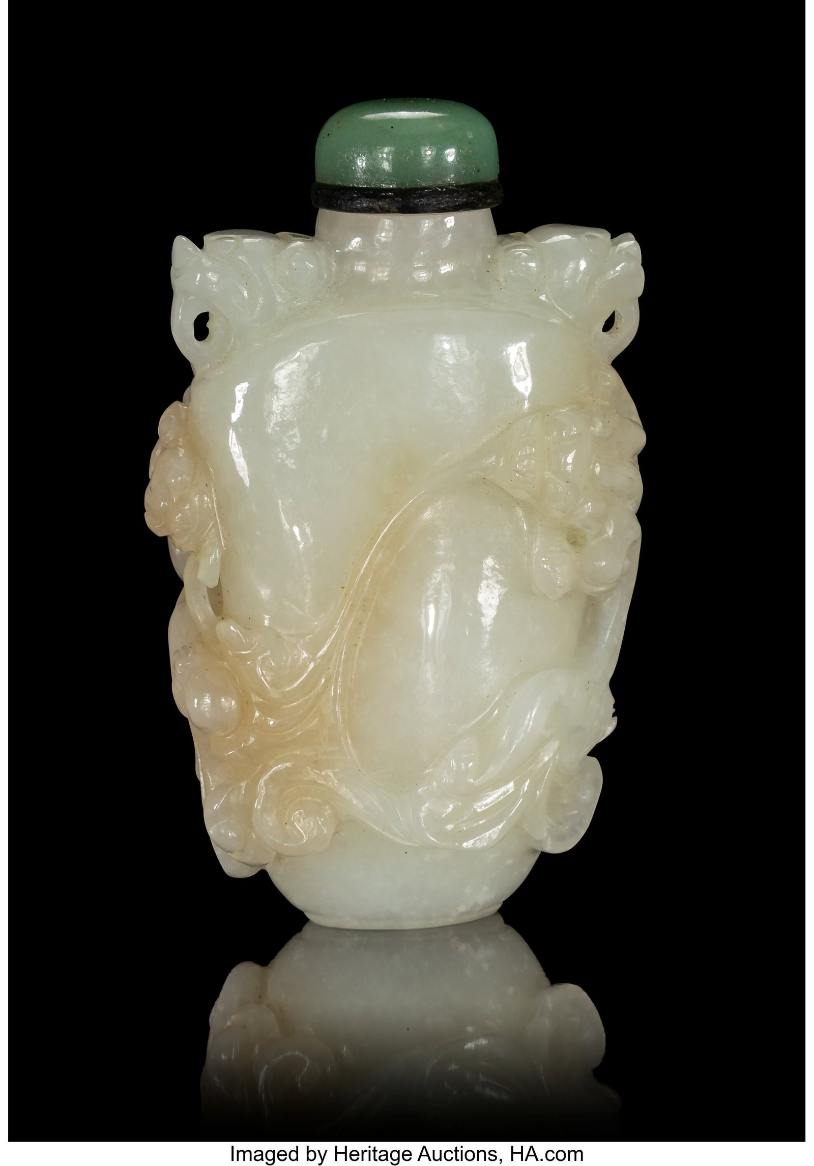 A Chinese Carved Jade Snuff Bottle, 19th century: A Chinese Carved Jade Snuff Bottle, 19th century 2-7/8 x 1-3/4 x 1 inches (7.3 x 4.4 x 2.5 cm) Property from the Collection of Jack and Jane Chin HID031010