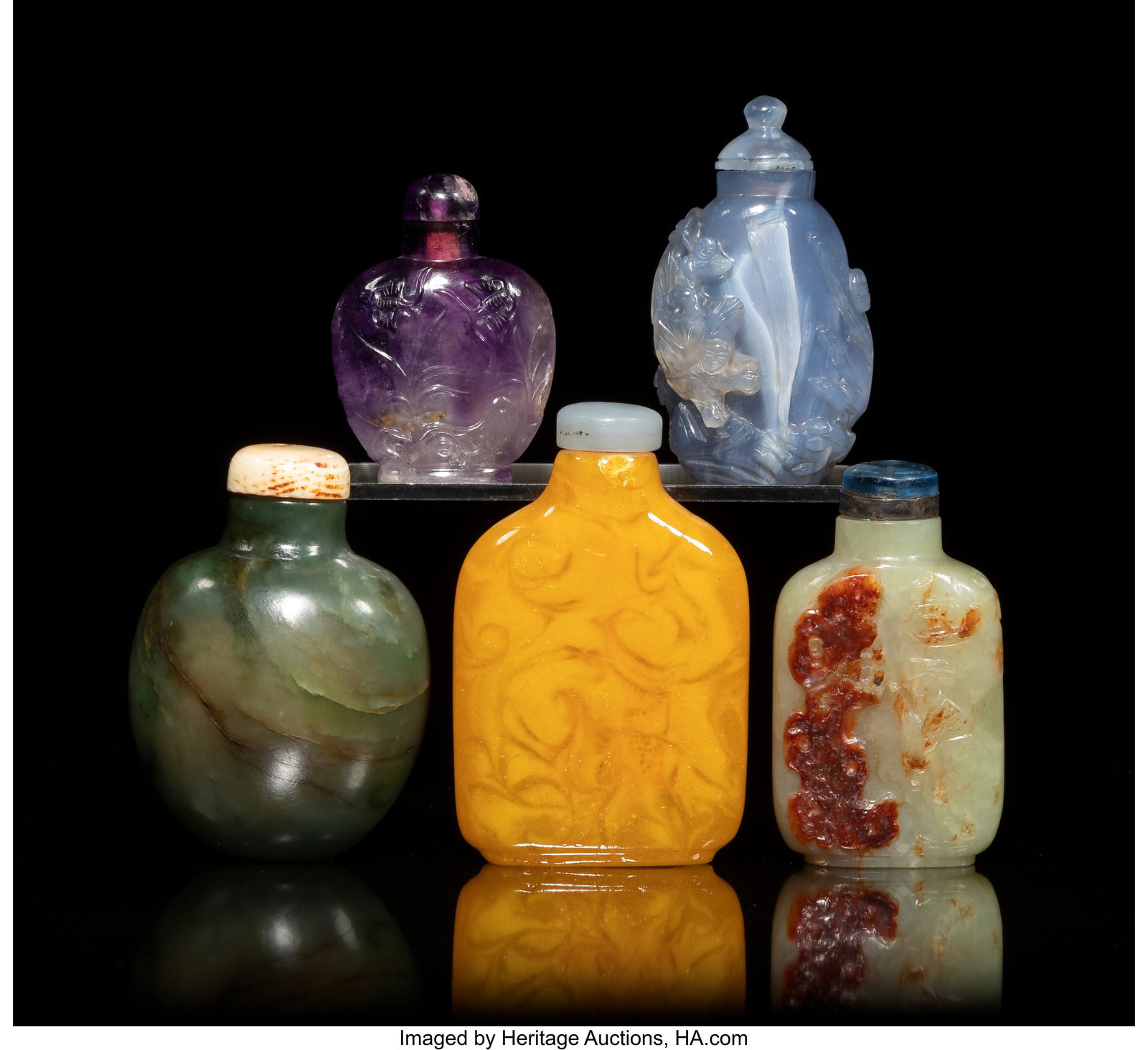 A Group of Five Chinese Carved Jade and Hardston: A Group of Five Chinese Carved Jade and Hardstone Snuff Bottles, 19th/ 20th century 2-3/4 x 1-3/4 x 0-1/2 inches (7.0 x 4.4 x 1.3 cm) (tallest