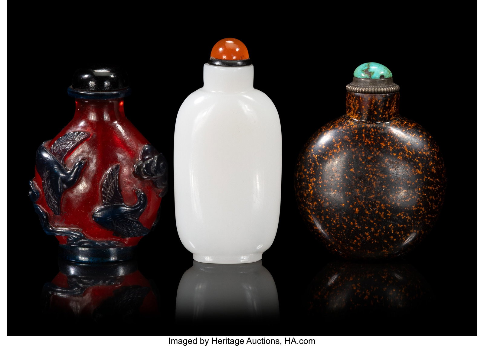 A Group of Three Chinese Glass Snuff Bottles, 19: A Group of Three Chinese Glass Snuff Bottles, 19th century 2-3/4 x 2-3/8 x 0-1/2 inches (7.0 x 6.0 x 1.3 cm) (tallest) The lot comprising&col