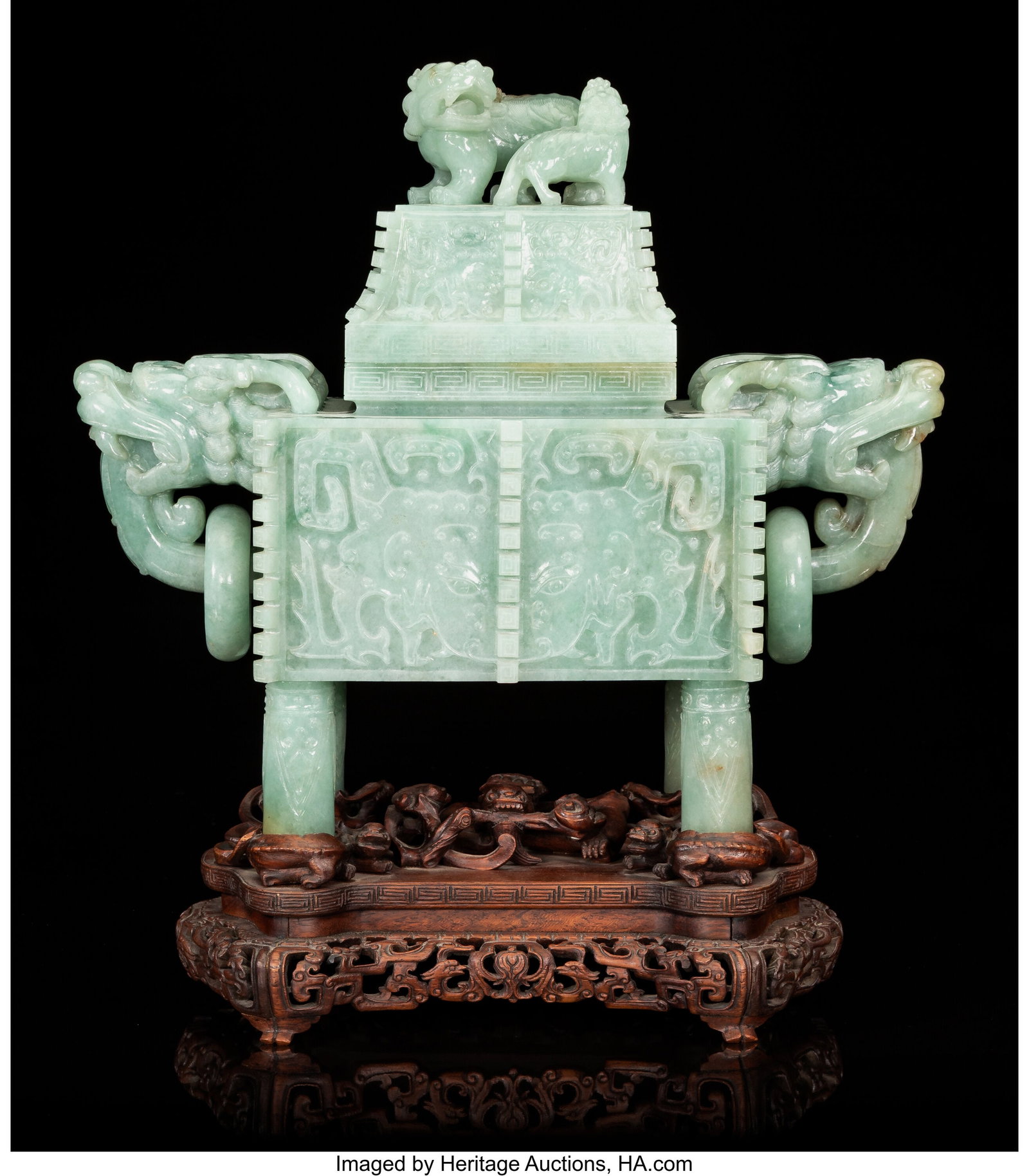 A Large Chinese Carved Jadeite Covered Censer on: A Large Chinese Carved Jadeite Covered Censer on Wood Stand Marks: incised four-character Qianlong mark 15 x 13-3/4 x 6-1/2 inches (38.1 x 34.9 x 16.5 cm) 