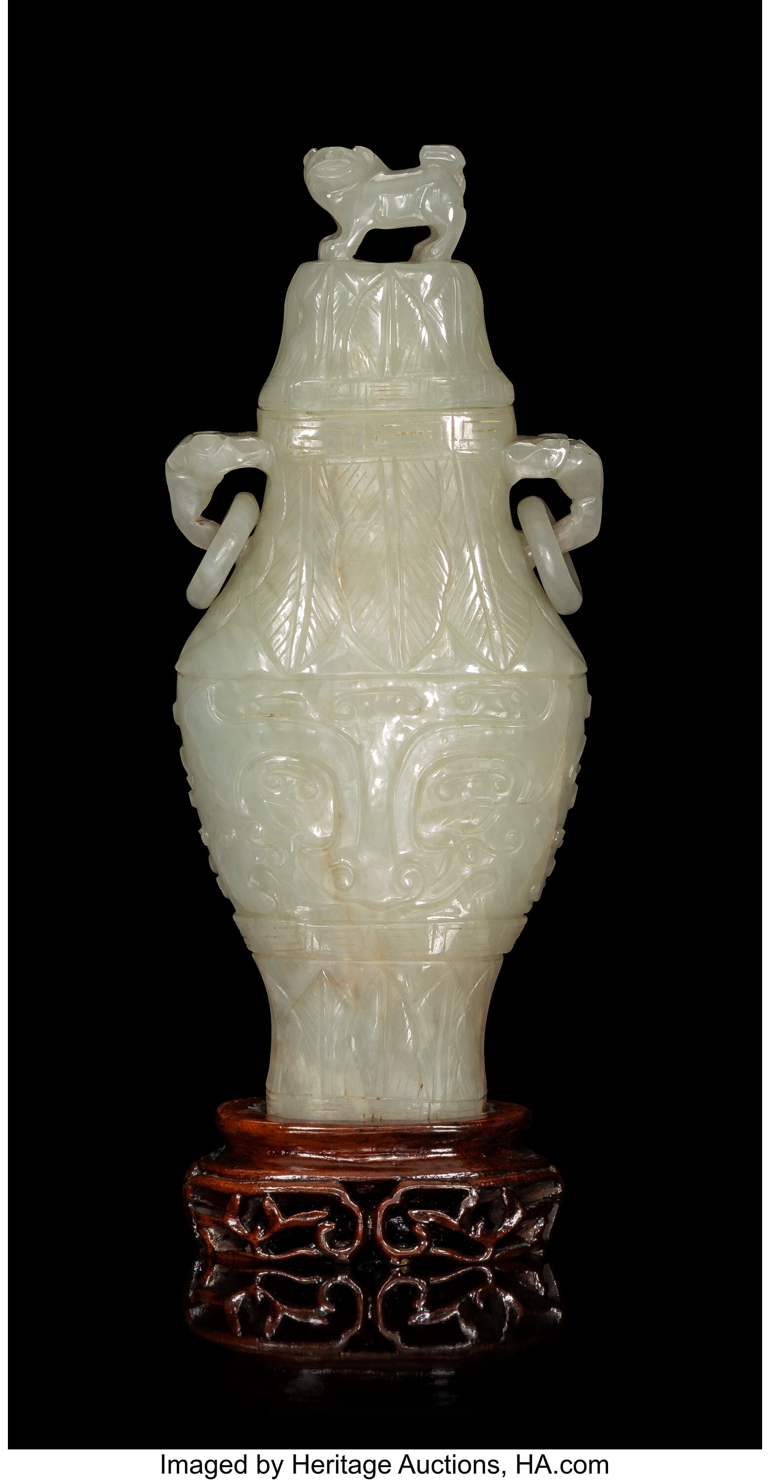 A Chinese Carved Celadon Jade Double-Handled Vas: A Chinese Carved Celadon Jade Double-Handled Vase with Cover, 19th century 7-3/4 x 3 x 1-1/2 inches (19.7 x 7.6 x 3.8 cm) (overall) the bottle va