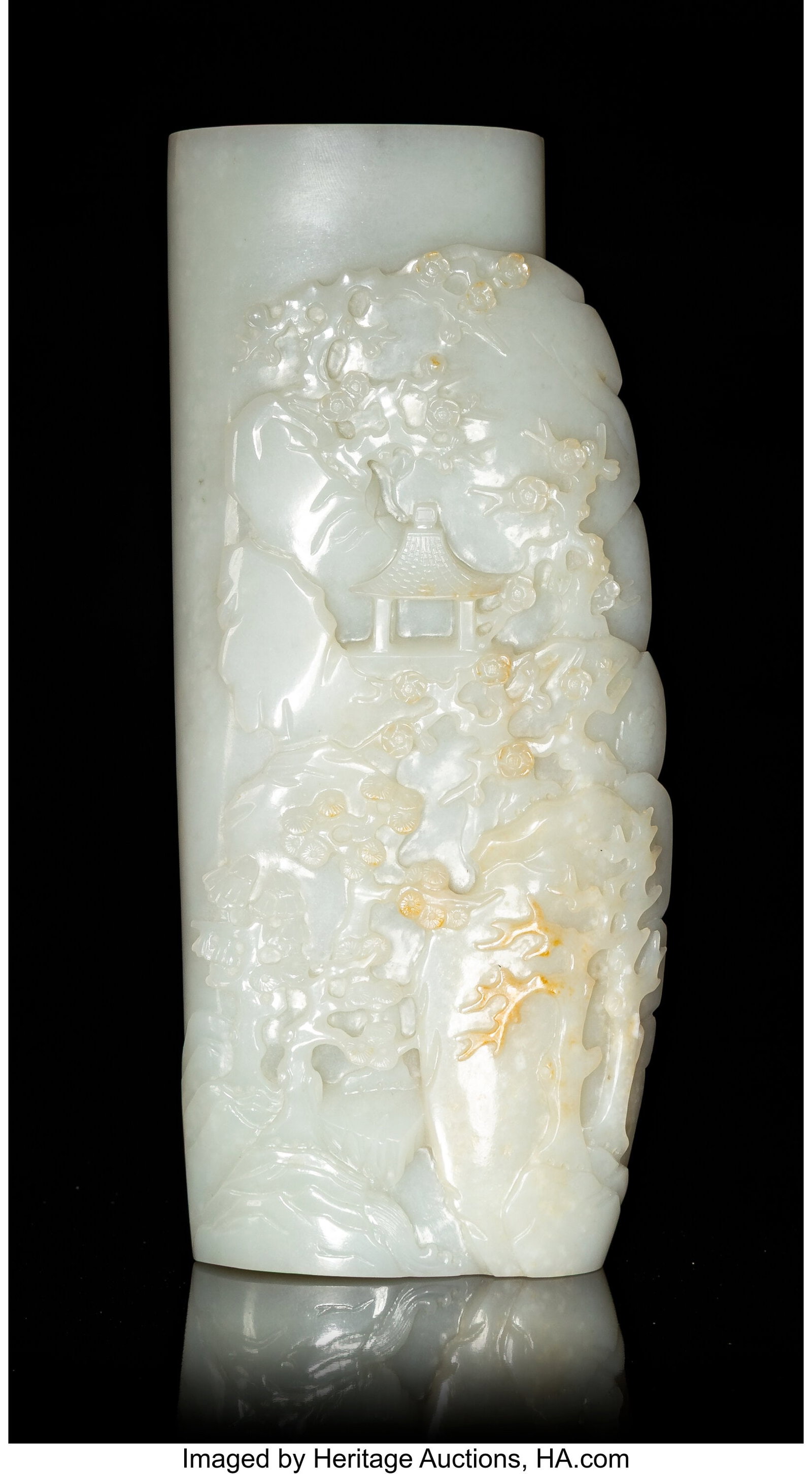 A Chinese Carved Russet White Jade Arm Rest, Qin: A Chinese Carved Russet White Jade Arm Rest, Qing dynasty 7-1/4 x 3-1/8 x 0-3/4 inches (18.4 x 7.9 x 1.9 cm) the front carved in low relief with a pavi