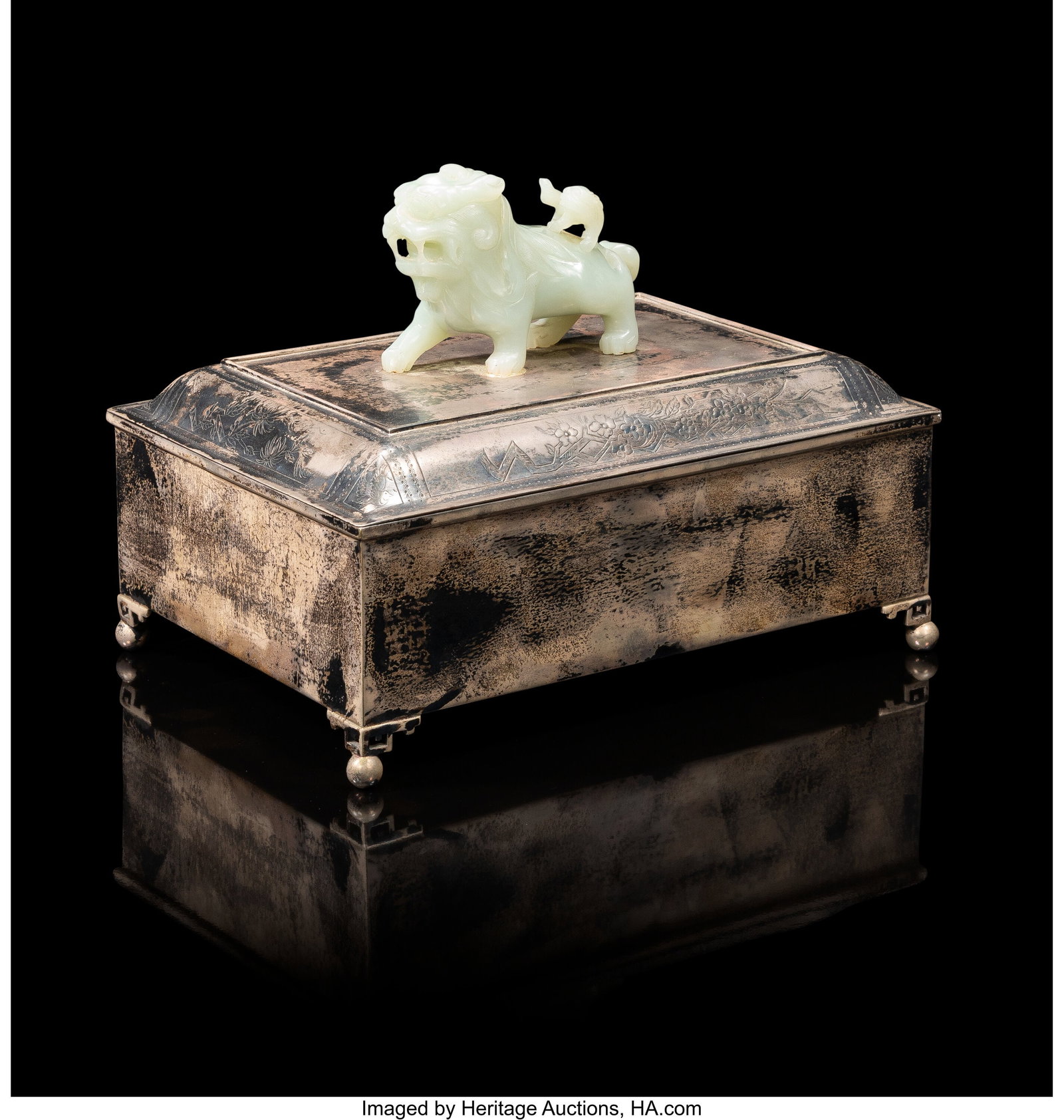 A Chinese Silver Covered Box with a Carved Jade : A Chinese Silver Covered Box with a Carved Jade Lion-Form Finial, 19th/20th century Marks: N291 6-3/4 x 9-1/8 x 6-3/8 inches (17.1 x 23.2 x 16.2 c