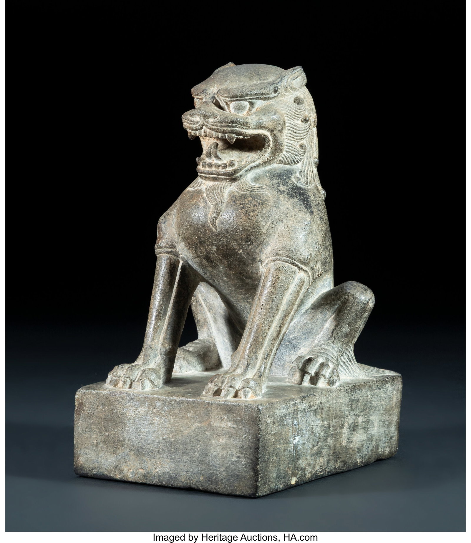 A Chinese Carved Grey Stone of a Seated Lion, Ta (1 of 3)
