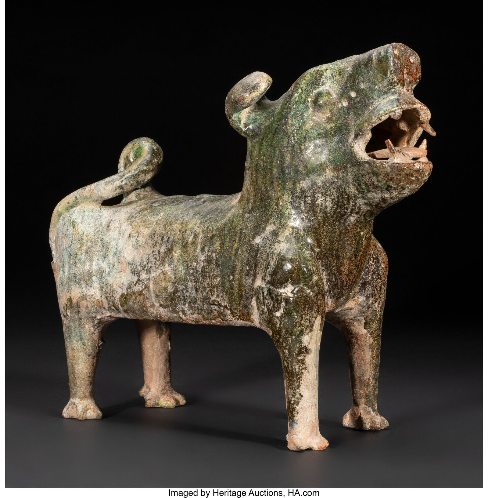 A Chinese Green-Glazed Pottery Dog, Han dynasty  (1 of 3)