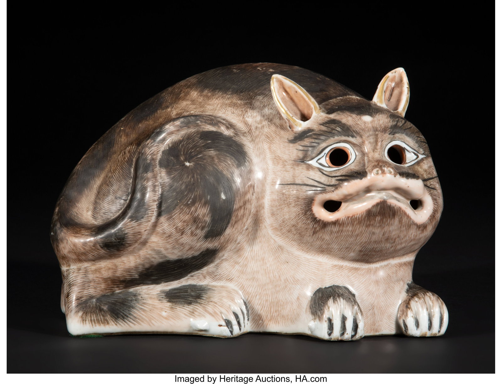A Chinese Export Enameled and Partial Gilt Cat-F: A Chinese Export Enameled and Partial Gilt Cat-Form Night Lantern, 18th century 5-5/8 x 8-1/4 x 7 inches (14.3 x 21.0 x 17.8 cm) modeled as a crouching cat