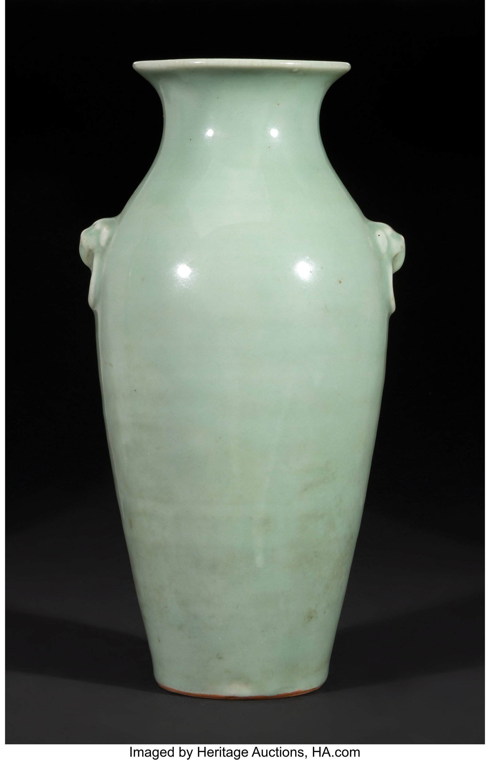 A Rare Chinese Celadon-Glazed Elephant-Form Hand: A Rare Chinese Celadon-Glazed Elephant-Form Handled Vase 12-1/2 x 6 x 5 inches (31.8 x 15.2 x 12.7 cm) Property from the Collection of Leonard David Snijder HID03101
