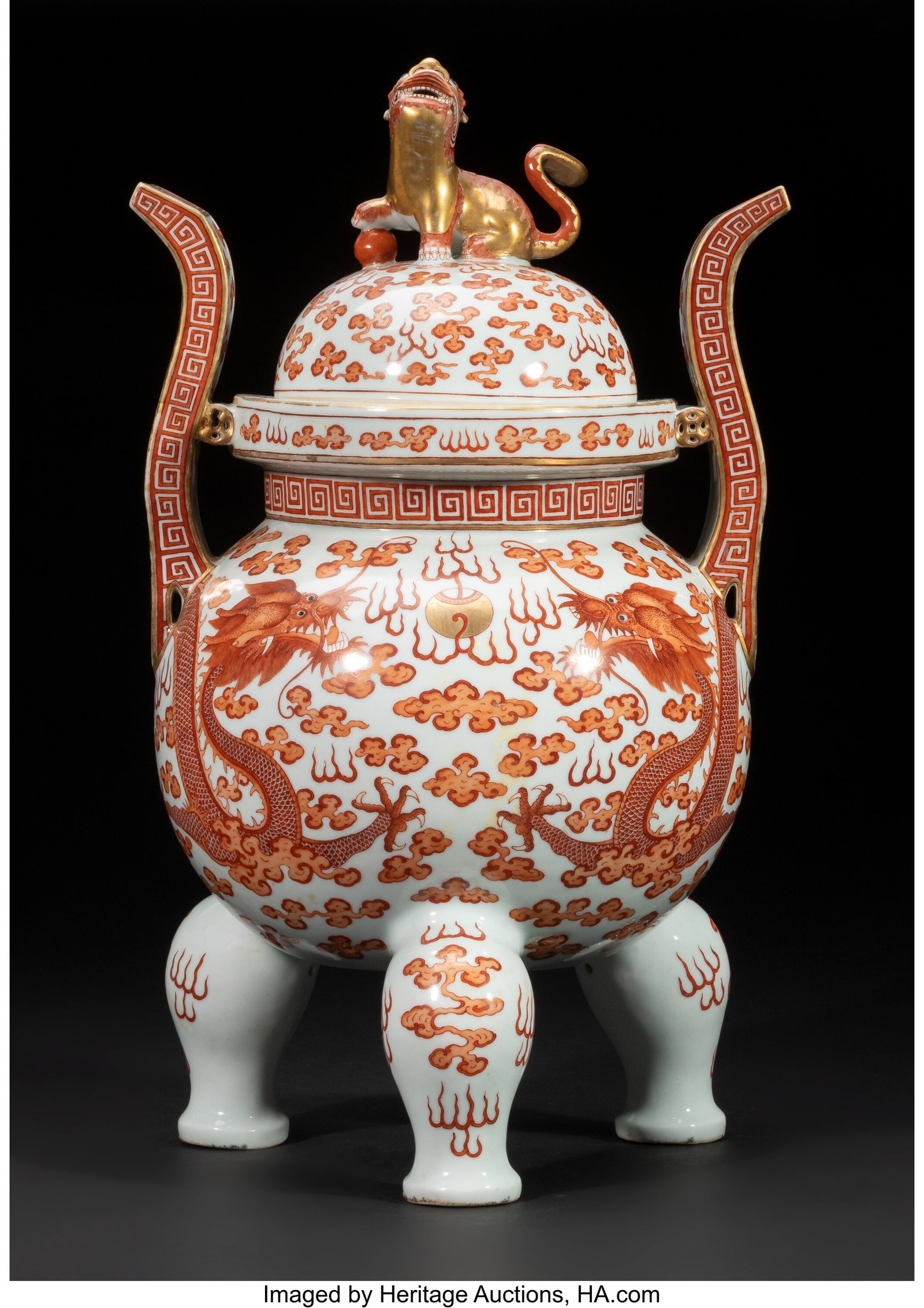 A Chinese Iron-Red and Gilt Decorated Covered Tr: A Chinese Iron-Red and Gilt Decorated Covered Tripod Censer, Republic period 19 x 10 x 10 inches (48.3 x 25.4 x 25.4 cm) the globular body featuring a pair of five