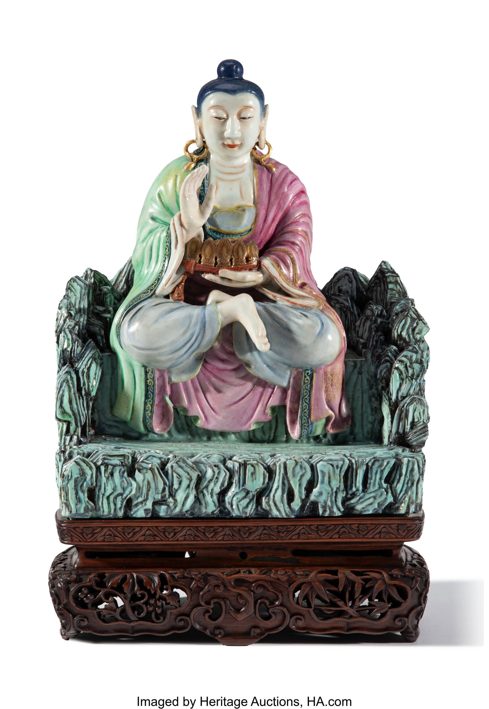 A Rare and Exceptional Chinese Molded Famille Ro: A Rare and Exceptional Chinese Molded Famille Rose Figure of the Arhat (Luohan) Rahula, 18th century Marks: dong wu (East Five) to underside of the figure 10-1/2 x 
