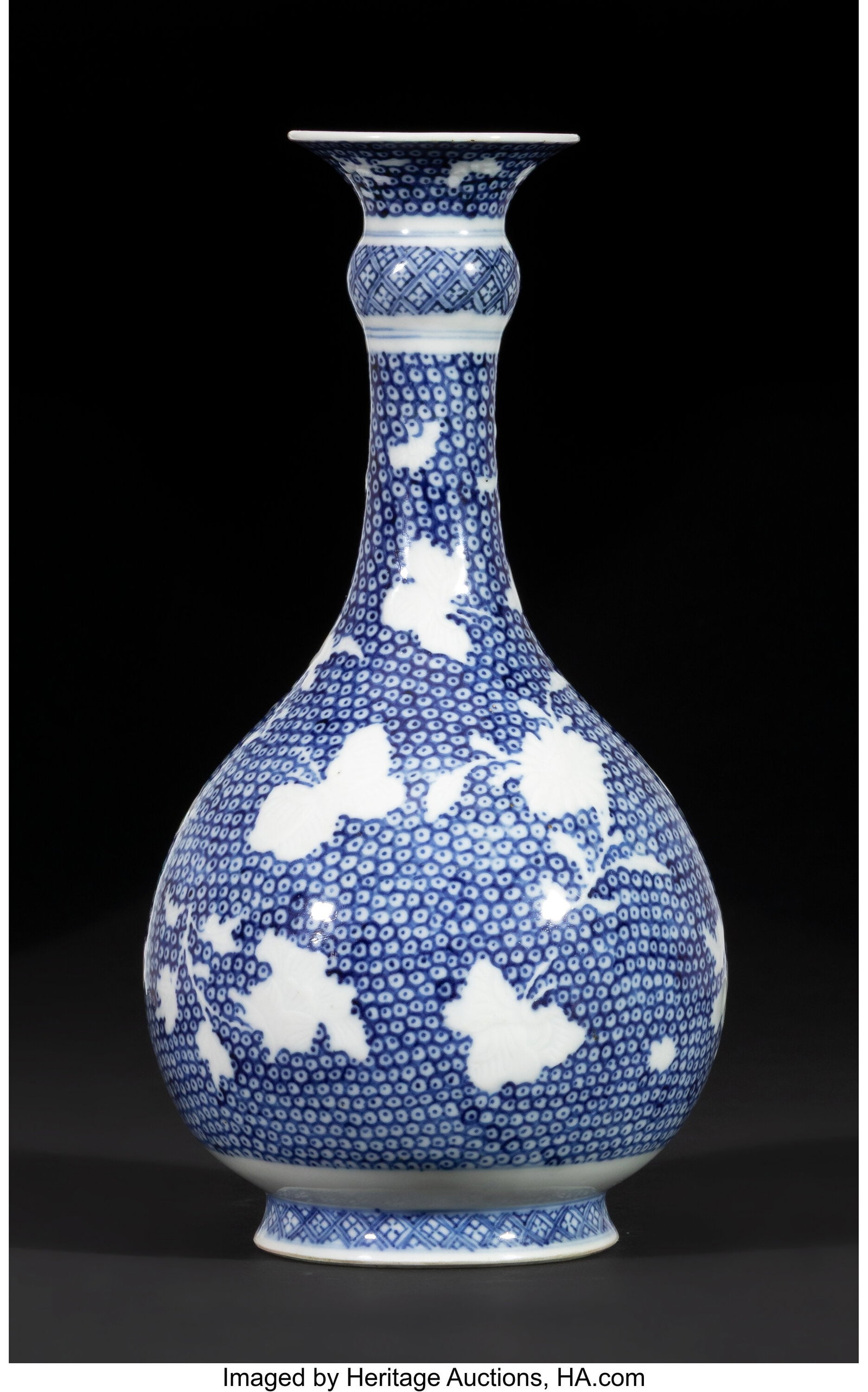A Chinese Export Blue and White 'Butterflies' Bo: A Chinese Export Blue and White 'Butterflies' Bottle Vase, Kangxi period 9-3/8 x 4-3/4 inches (23.8 x 12.1 cm) (diam.) Property from the Collecti