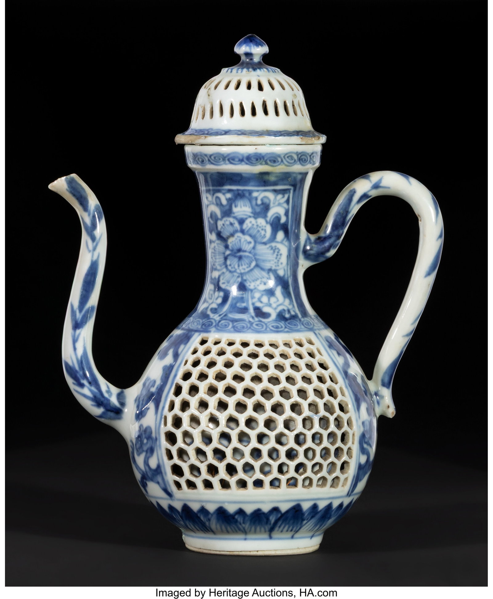 A Chinese Blue and White Reticulated Double-Wall: A Chinese Blue and White Reticulated Double-Walled Covered Ewer, Wanli period 8-1/4 x 4 x 6-1/4 inches (21.0 x 10.2 x 15.9 cm) Property from the Collection
