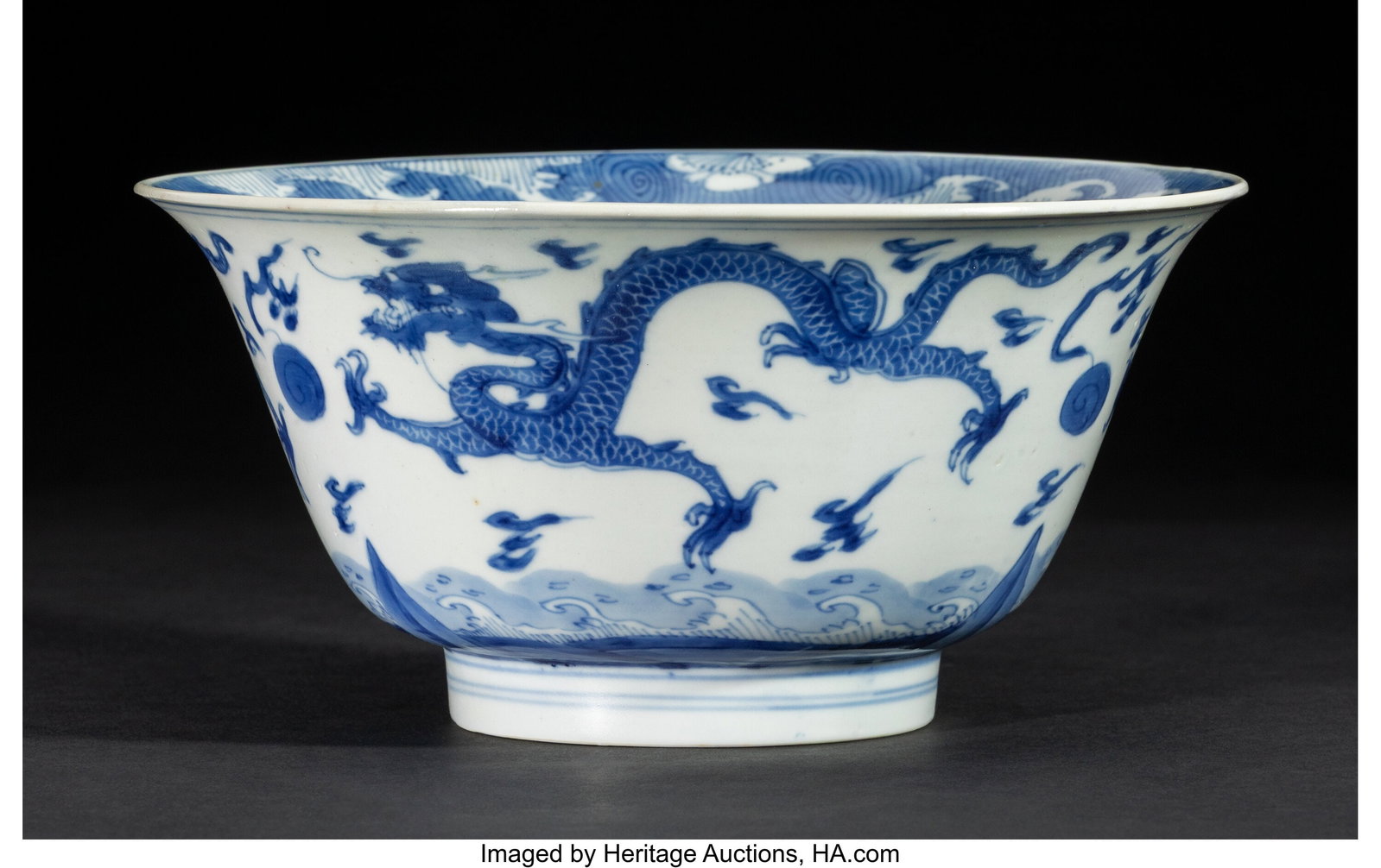 A Chinese Blue and White 'Dragon' Bowl, Kangxi p: A Chinese Blue and White 'Dragon' Bowl, Kangxi period Marks: apocryphal six-character Chenghua mark 3-3/4 x 7-7/8 inches (9.5 x 20.0 cm) (diam.&
