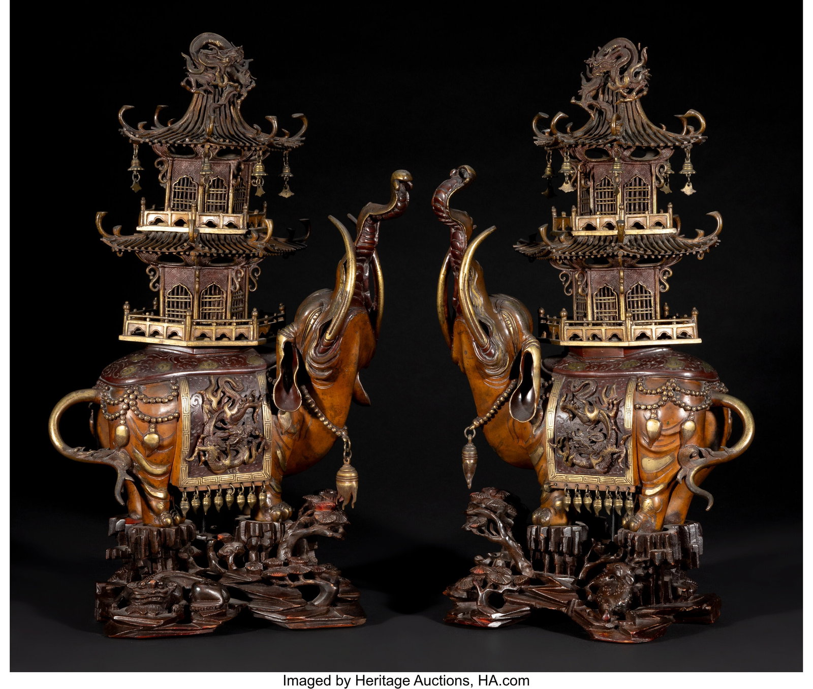A Pair of Japanese Gilt Bronze Elephant-Form Inc: A Pair of Japanese Gilt Bronze Elephant-Form Incense Burners with Fitted Wood Stands, Meiji period 22-1/2 x 13 x 9 inches (57.1 x 33.0 x 22.9 cm) (each&co