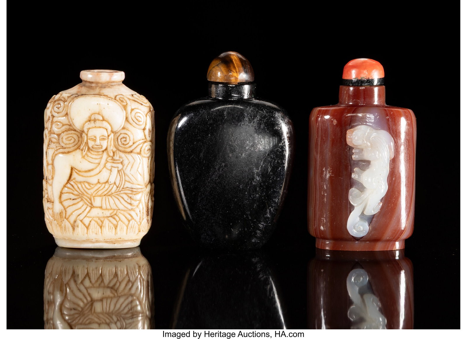 A Group of Three Chinese Hardstone Snuff Bottles (1 of 2)