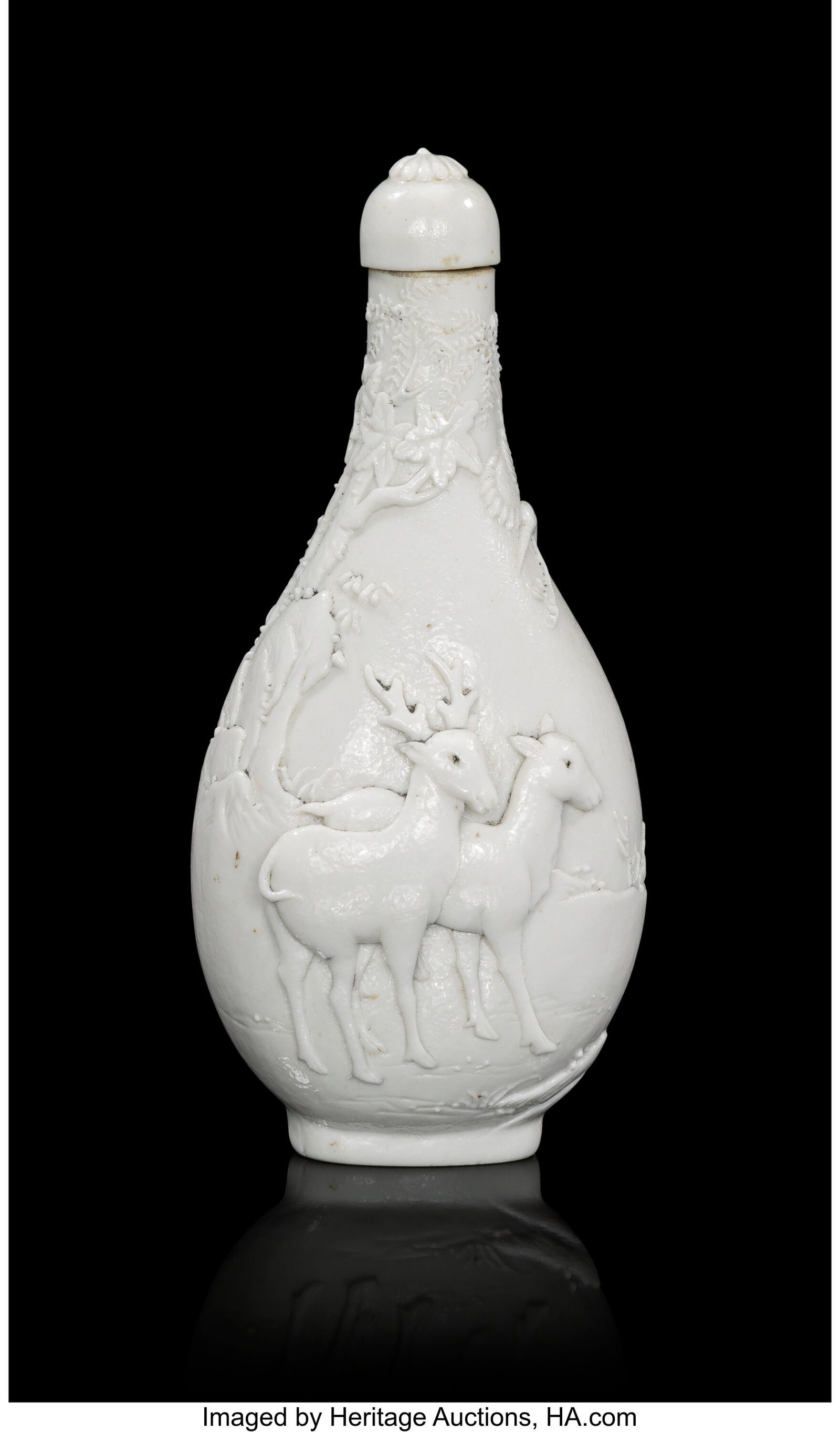 A Chinese Carved and Molded White Porcelain 'Dee: A Chinese Carved and Molded White Porcelain 'Deer' Snuff Bottle, 19th century Marks: impressed four-character seal mark of Chen Guozhi (Chinese, c. 1800-1860) 4 x 1-