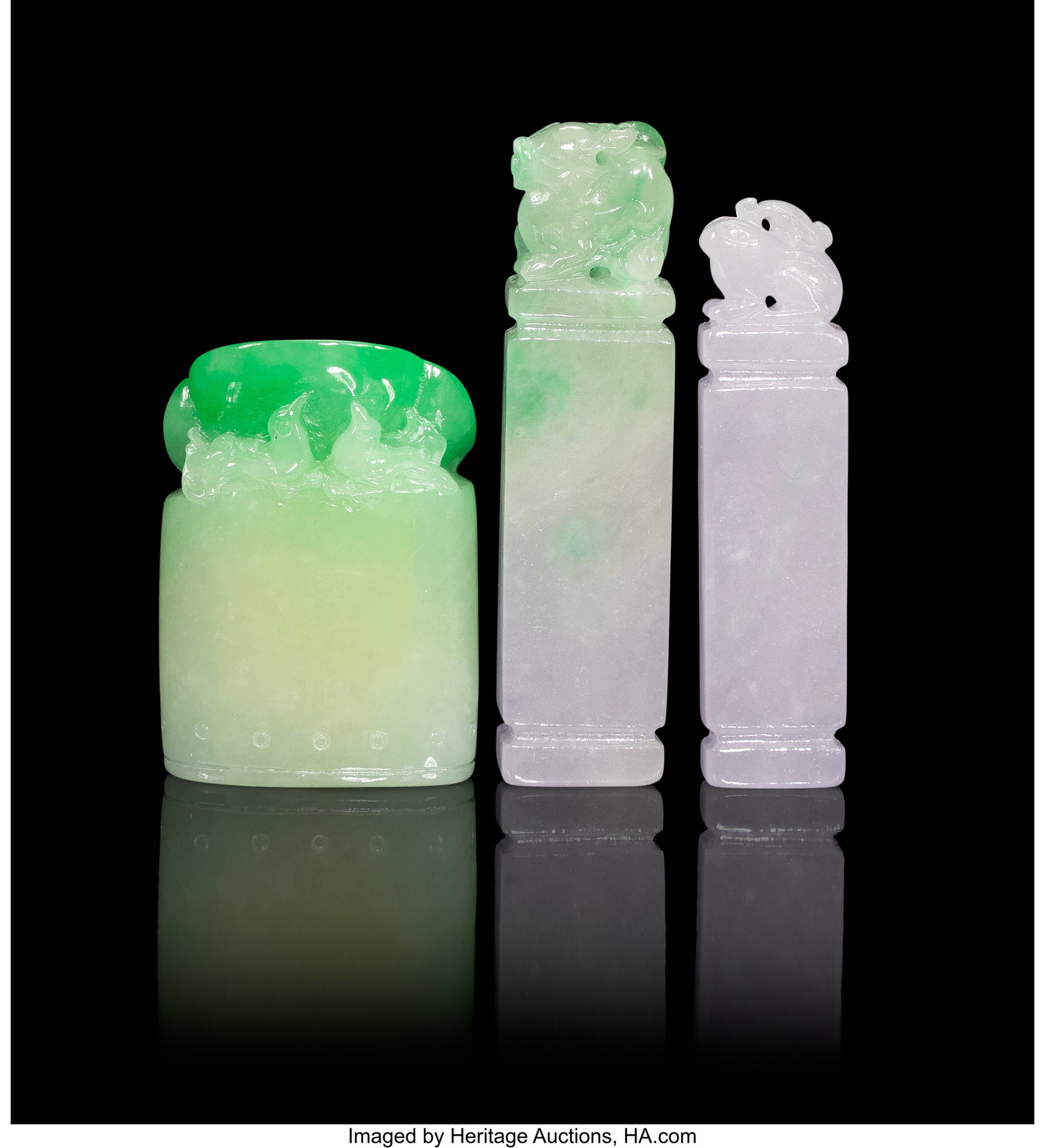 A Group of Three Chinese Carved Jadeite Seals, 2: A Group of Three Chinese Carved Jadeite Seals, 20th century 2-1/2 x 0-5/8 x 0-3/8 inches (6.3 x 1.6 x 1.0 cm) (tallest) HID03101062020 ©