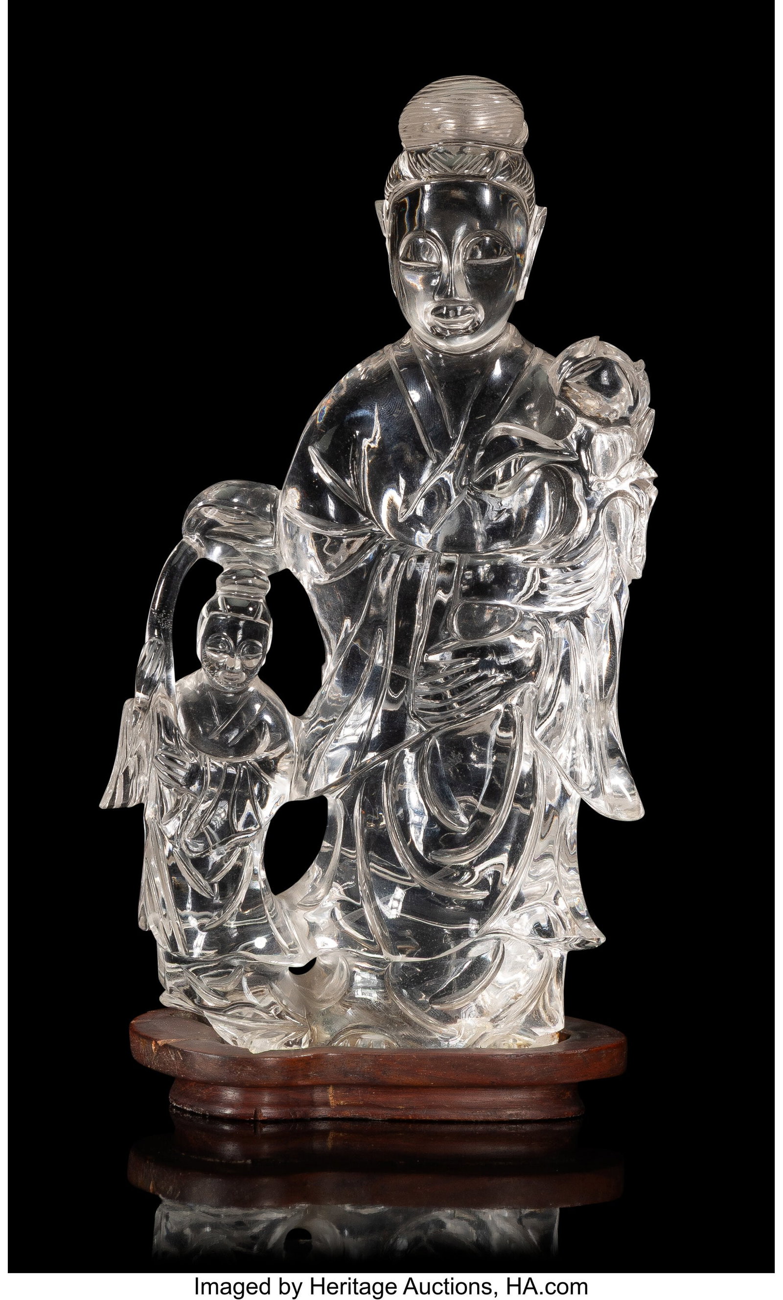A Chinese Carved Rock Crystal Guanyin and Attend: A Chinese Carved Rock Crystal Guanyin and Attendant, 20th century 8-1/2 x 4-1/2 x 2-1/4 inches (21.6 x 11.4 x 5.7 cm) (overall) HID0310106202