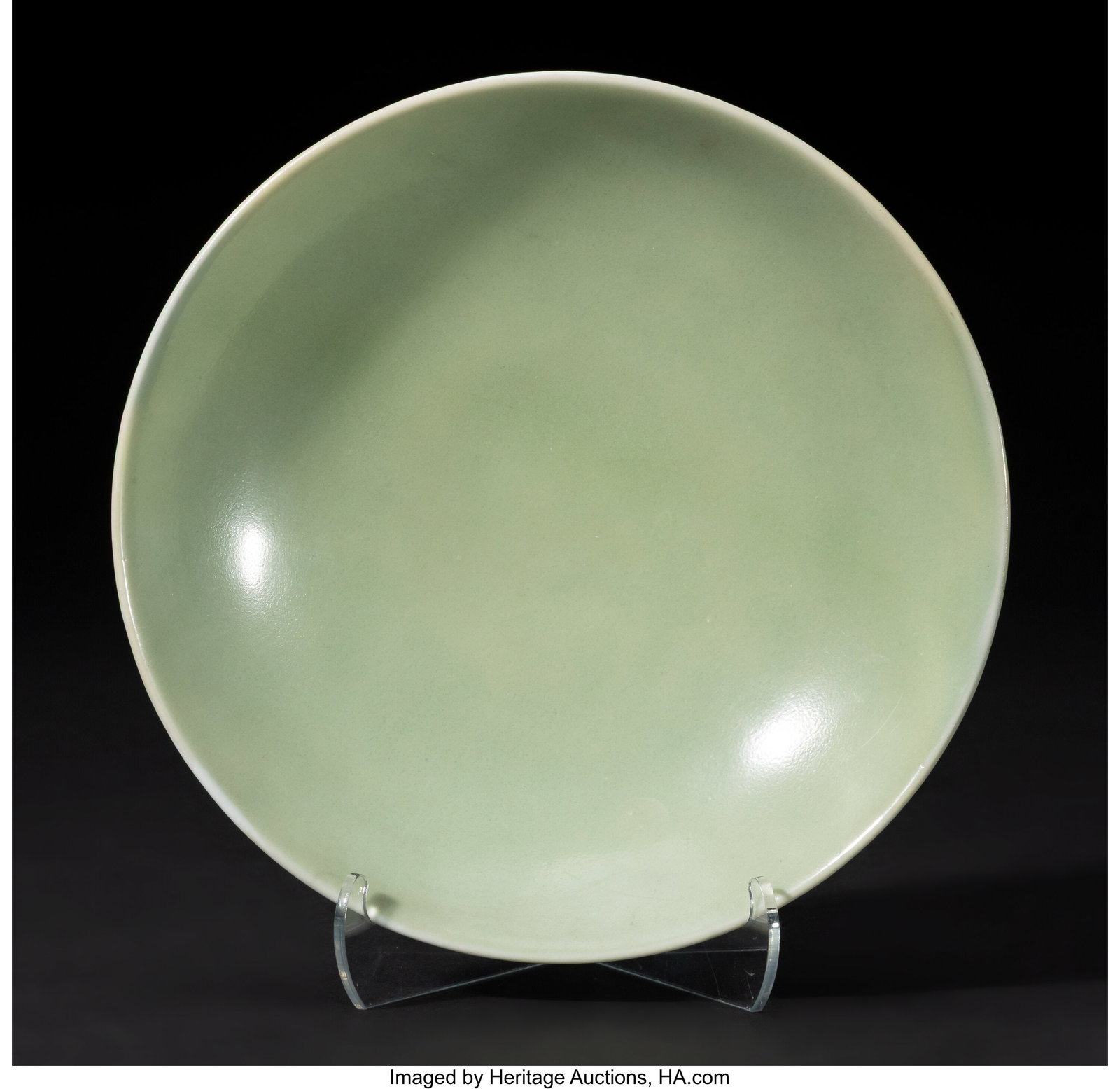 A Chinese Celadon-Glazed 'Lotus' Dish, six-chara: A Chinese Celadon-Glazed 'Lotus' Dish, six-character Kangxi mark and of the period 1-3/4 x 6-1/2 inches (4.4 x 16.5 cm) (diam.) HID03101062020 &c