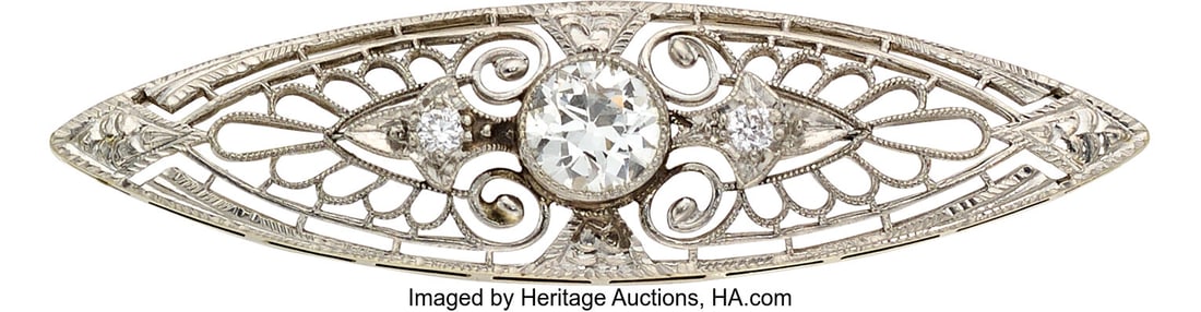 Krementz Edwardian, Diamond, Platinum-Topped Gol: Krementz Edwardian, Diamond, Platinum-Topped Gold Brooch Stones: European-cut diamond weighing approximately 0.25 carat; transitional-cut diamonds Metal: Platinum-t