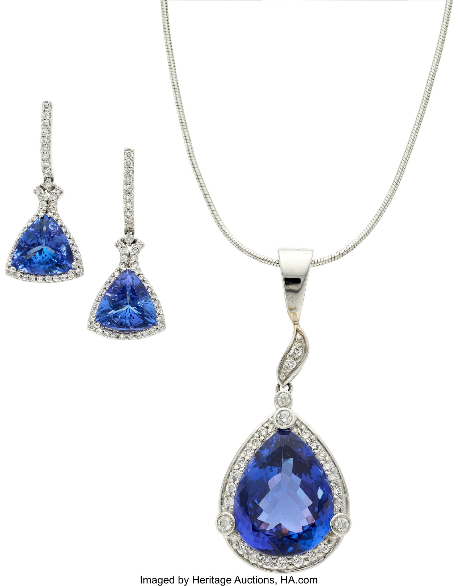 Tanzanite, Diamond, White Gold Jewelry Suite St: Tanzanite, Diamond, White Gold Jewelry Suite Stones: Pear-shaped tanzanite weighing approximately 15.00 carats; triangular-shaped tanzanites weighing a total of approxima