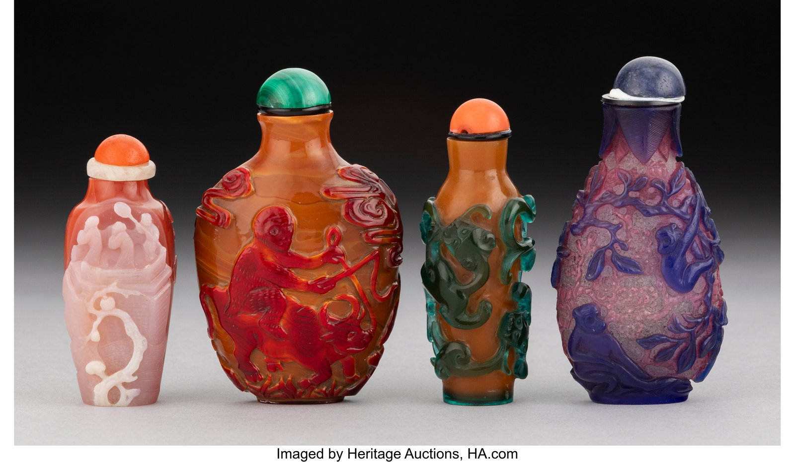 A Group of Four Chinese Glass Overlay Snuff Bott (1 of 3)