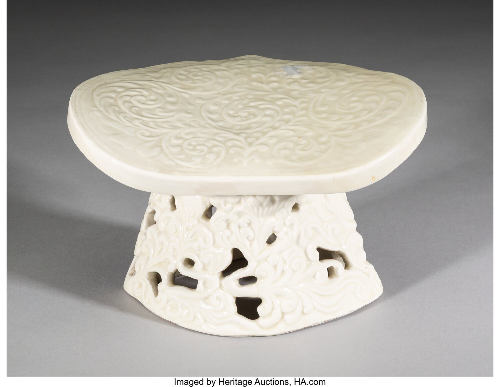 A Chinese Porcelain Pillow 5-1/4 x 8-5/8 x 6-5/8: A Chinese Porcelain Pillow 5-1/4 x 8-5/8 x 6-5/8 inches (13.3 x 21.9 x 16.8 cm) HID03101062020 © 2026 Heritage Auctions | All Rights Reserved www&p