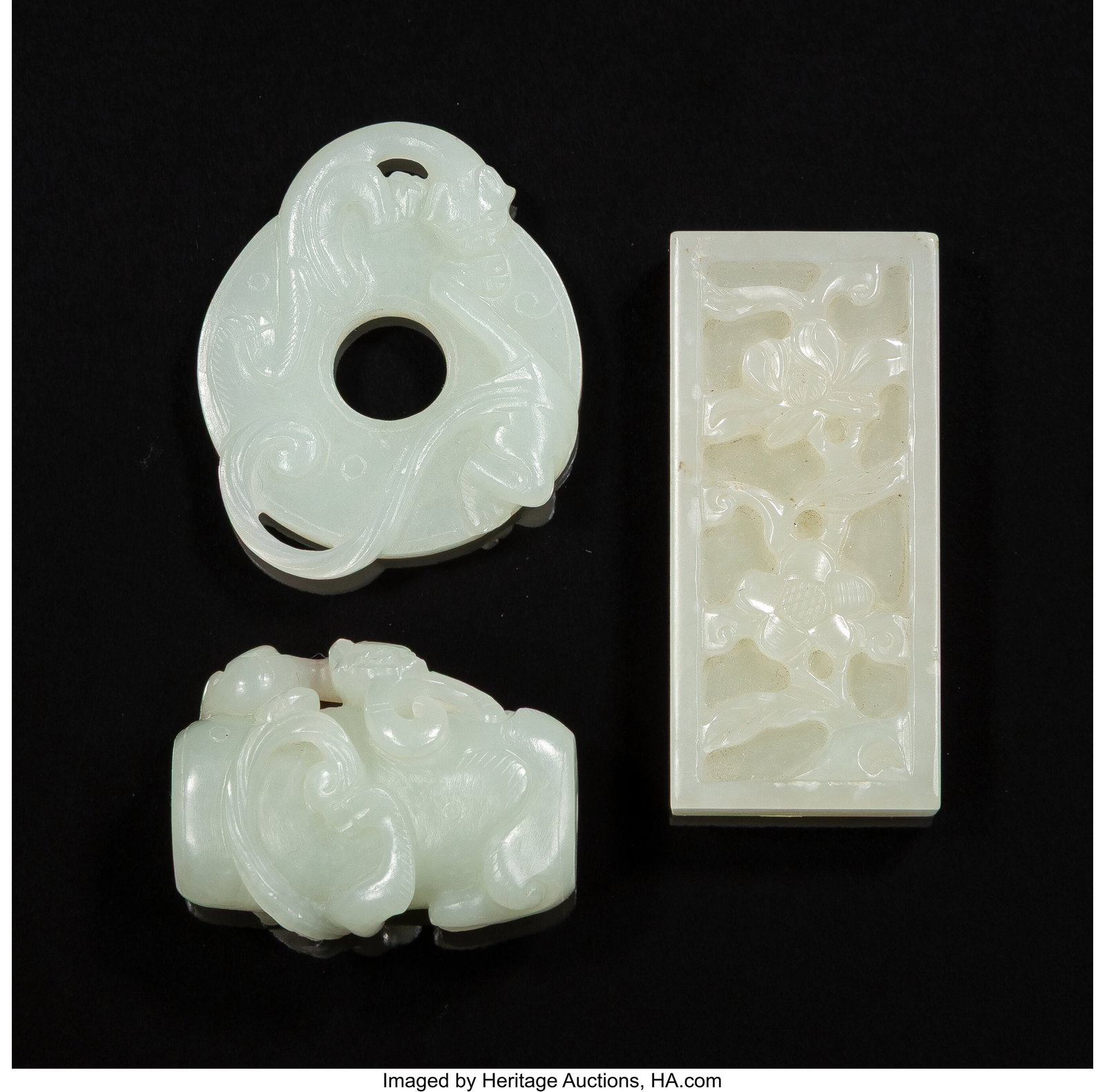 A Group of Three Chinese Carved Jade Pendants 2- (1 of 3)
