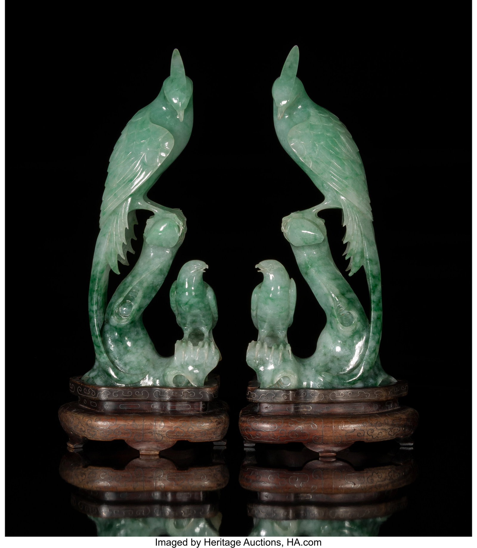 A Pair of Chinese Carved Jadeite Birds on Stands: A Pair of Chinese Carved Jadeite Birds on Stands 7-3/4 x 3-1/2 x 1-1/2 inches (19.7 x 8.9 x 3.8 cm) (each, work) 9 x 3-3/4 x 3-3/8 in