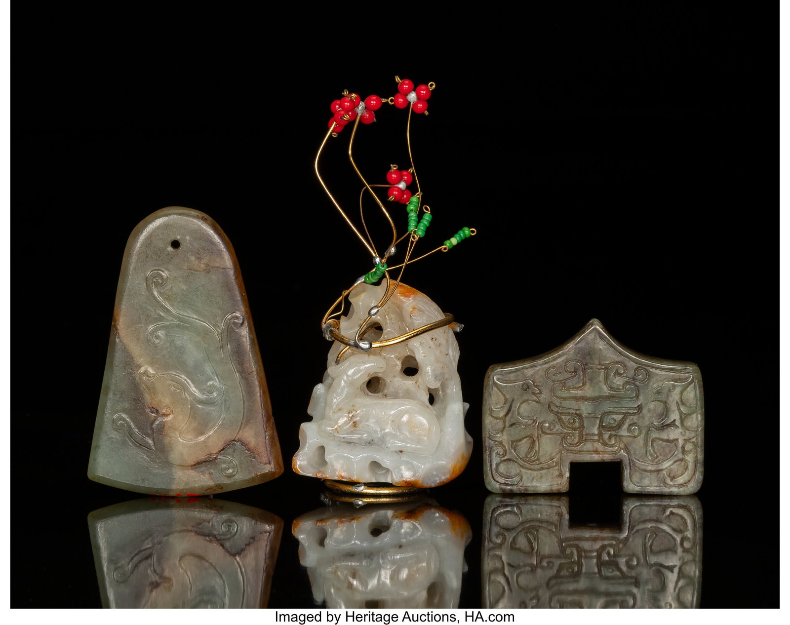 Two Chinese Jade Pendants and One Brass-Mounted : Two Chinese Jade Pendants and One Brass-Mounted Carving Marks to one: De Wan 4-1/4 x 2 x 2 inches (10.8 x 5.1 x 5.1 cm) The group comprising: 2 pendants&