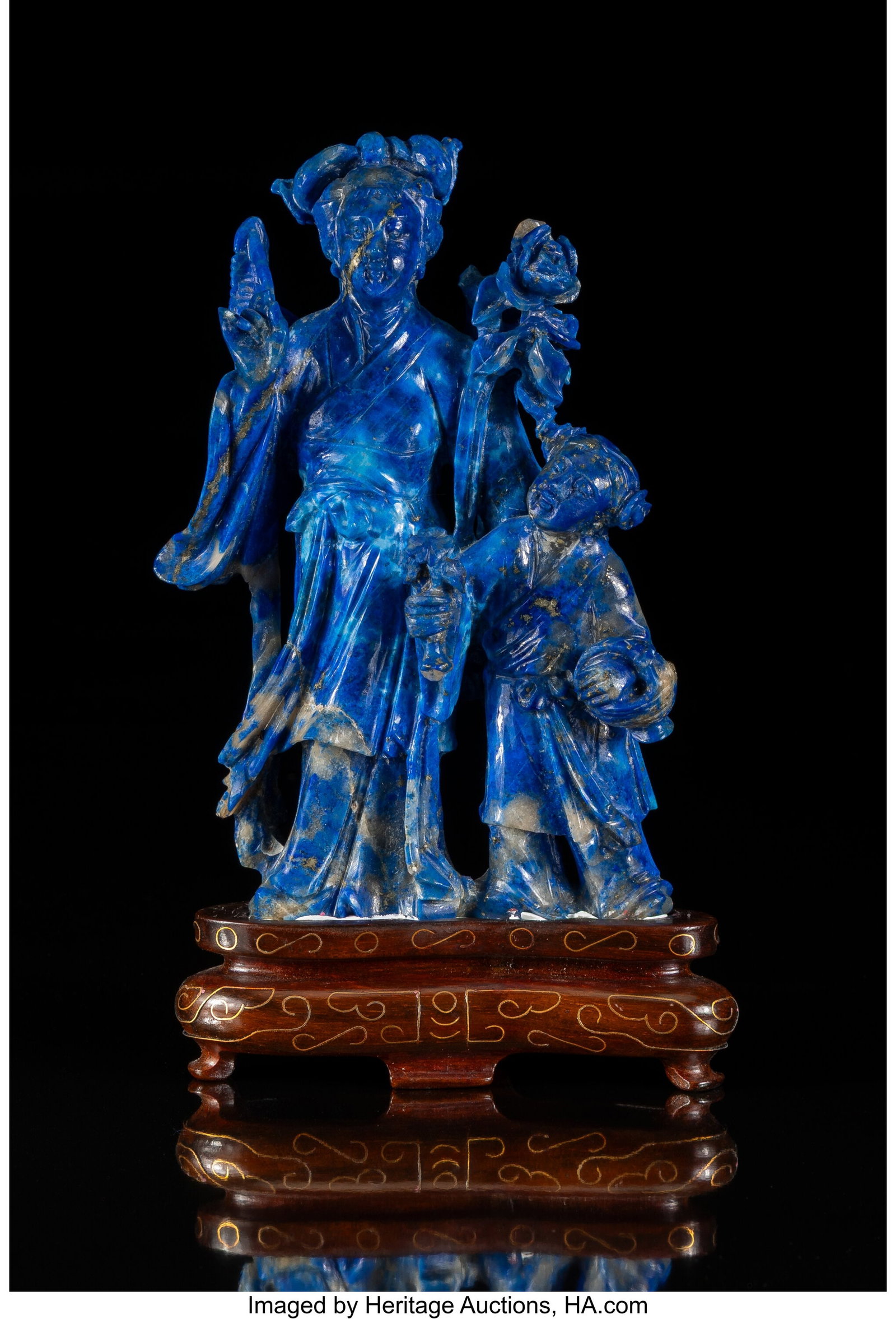 A Chinese Carved Lapis Lazuli Figural Group of a: A Chinese Carved Lapis Lazuli Figural Group of a Beauty and Child on Wood Stand 6 x 3-1/2 x 1-3/4 inches (15.2 x 8.9 x 4.4 cm) (overall) HID03101062020