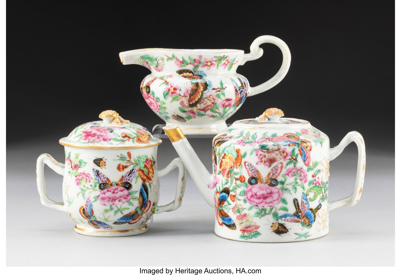 A Three-Piece Chinese Export Famille Rose Tea Se: A Three-Piece Chinese Export Famille Rose Tea Set, 19th century 3-3/8 x 6-1/4 x 3-5/8 inches (8.6 x 15.9 x 9.2 cm) (tallest, teapot) Th