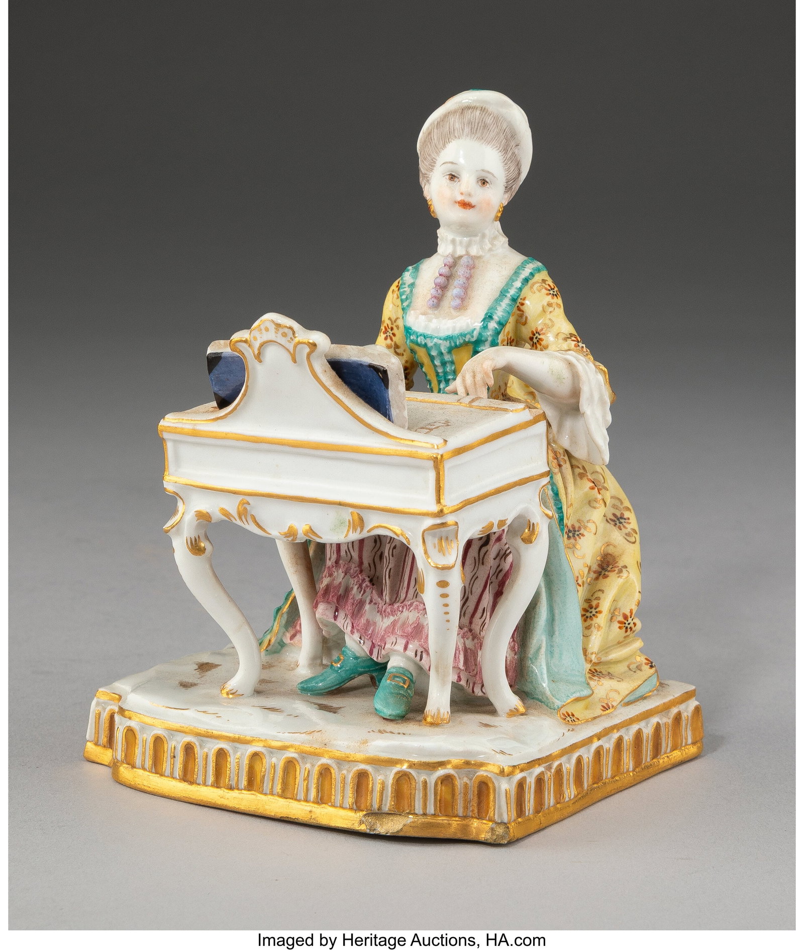 A Meissen Partial Gilt Porcelain Figure: Sense o: A Meissen Partial Gilt Porcelain Figure: Sense of Hearing, 19th century Modeled by Johann Karl Schönheit Marks: (factory mark in blue underglaze), E1, 147&