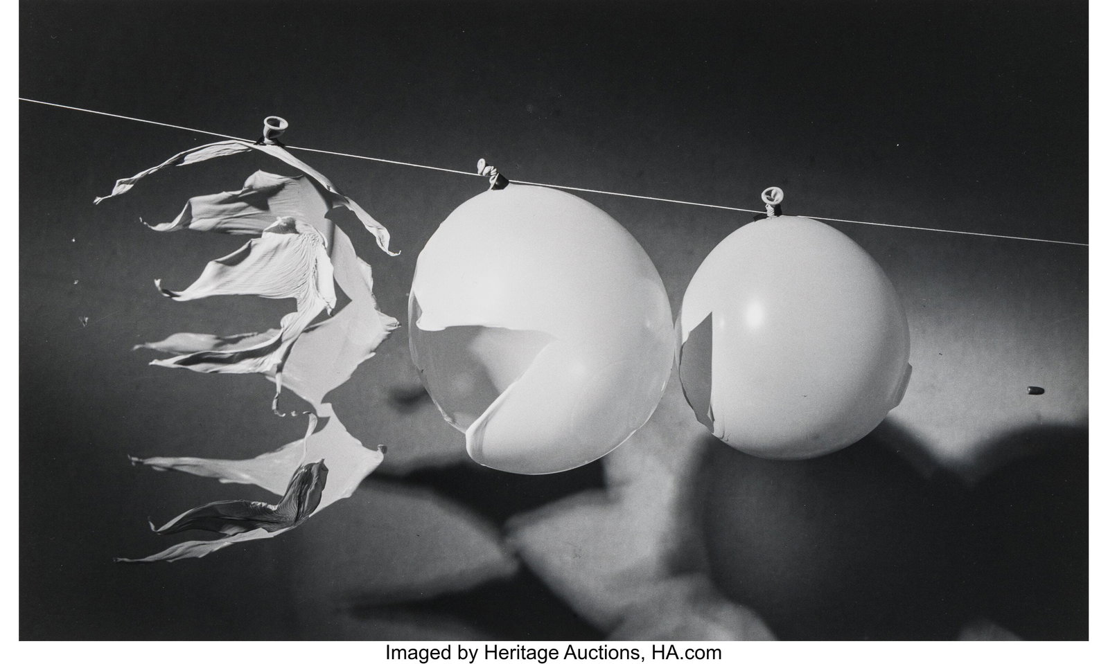 Dr. Harold Eugene Edgerton (American, 1903-1990): Dr. Harold Eugene Edgerton (American, 1903-1990) Bullet Through Balloons, 1959 Gelatin silver print, printed later 11-1/2 x 23 inches (29.2 x 58&peri