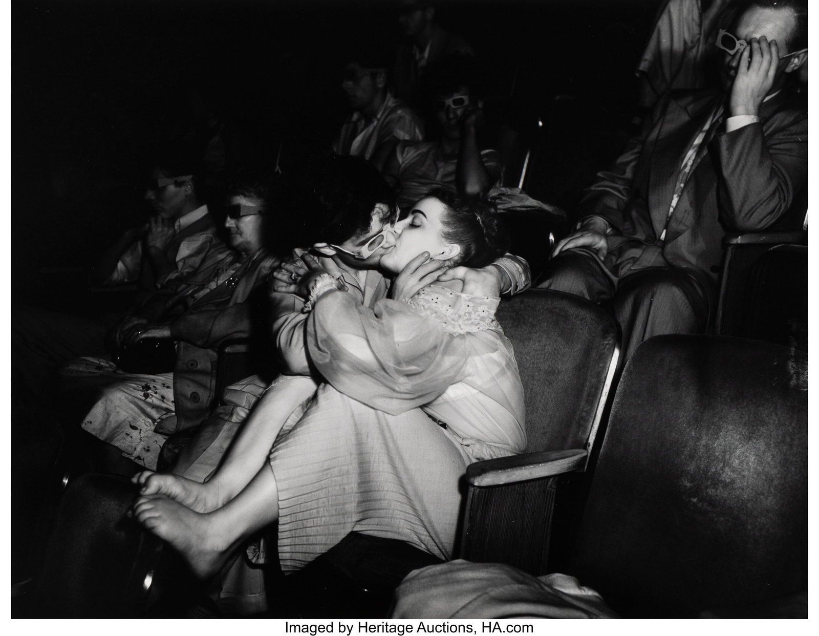 Weegee (American, 1899-1968) Lovers at the Palac: Weegee (American, 1899-1968) Lovers at the Palace Theatre, circa 1945 Gelatin silver print, printed later 9-3/4 x 12-5/8 inches (24.8 x 32.1 cm&r