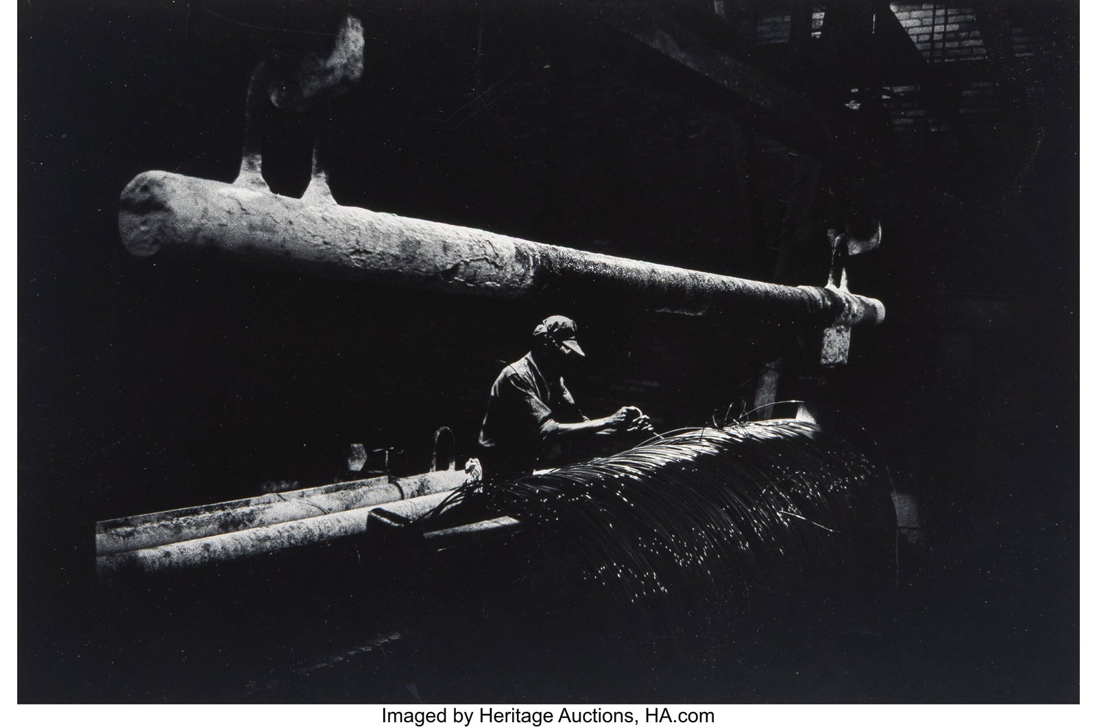 W. Eugene Smith (American, 1918-1978) Worker wit: W. Eugene Smith (American, 1918-1978) Worker with Wires, Pittsburgh, 1955-1956 Gelatin silver print 9 x 13-3/4 inches (22.9 x 34.9 cm) &l