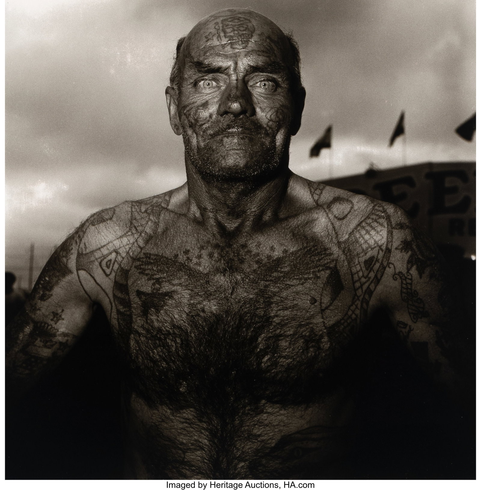 Diane Arbus (American, 1923-1971) Tattooed Man a: Diane Arbus (American, 1923-1971) Tattooed Man at a Carnival, Maryland, 1970 Gelatin silver print, printed by Neil Selkirk 14-3/4 x 14-1/2 inches (37&per