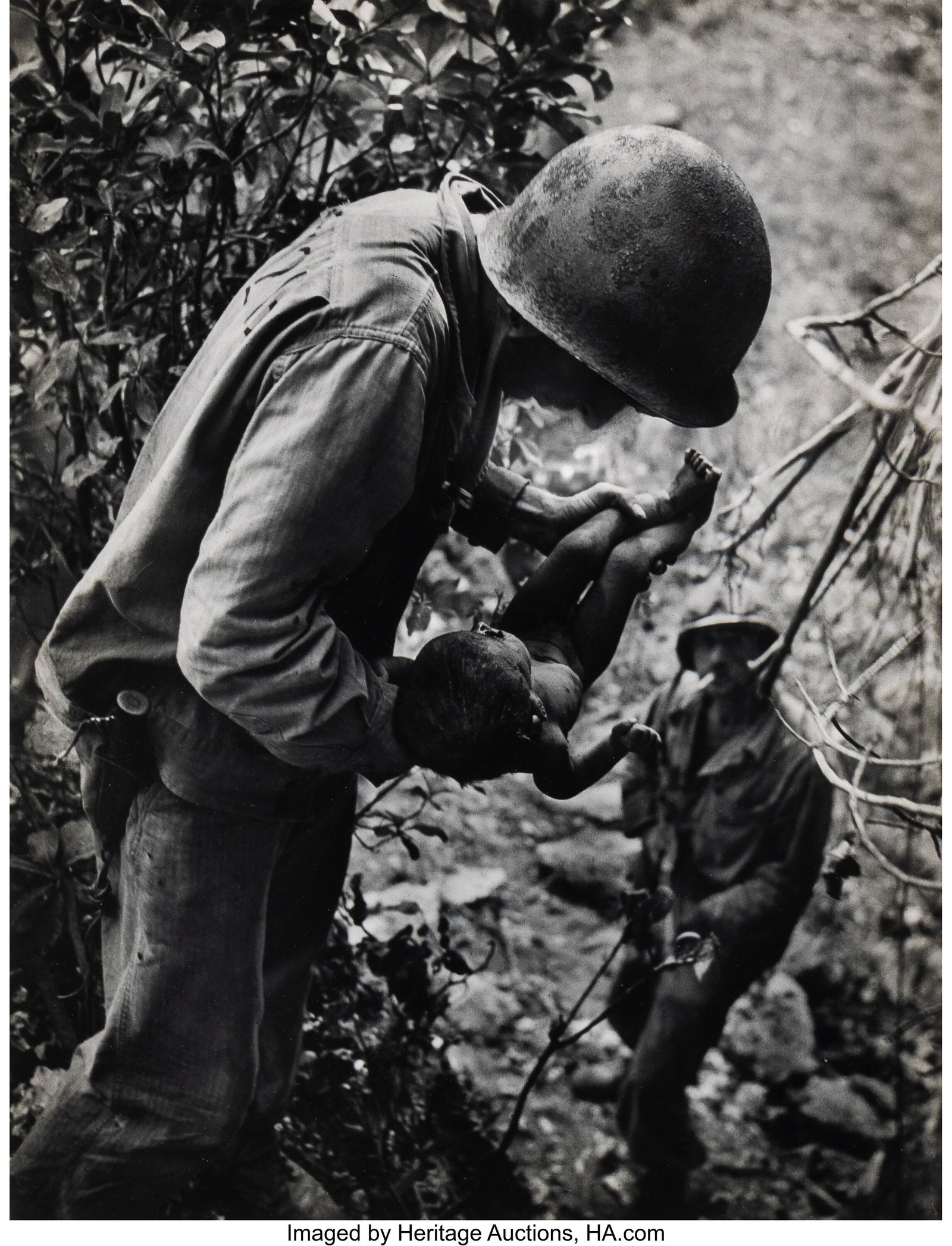 W. Eugene Smith (American, 1918-1978) Wounded Ba (1 of 2)
