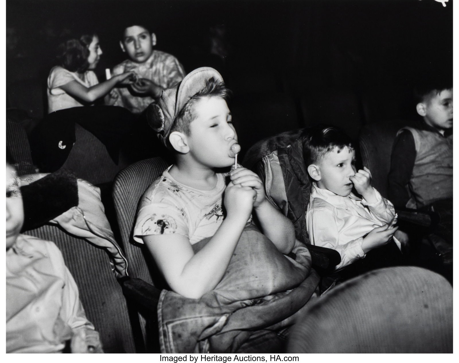 Weegee (American, 1899-1968) Children at the Mov: Weegee (American, 1899-1968) Children at the Movie Theater, New York (3 works), circa 1943 Gelatin silver print, printed after 1963 7-1/8 x 9 inches &lp
